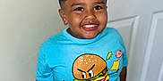 Jeremiah joined the competition — help win amazing prizes! boy, burger, cartoon, casual, child, clothing, cute, door, funny, happy, indoor, person, pizza, portrait, shorts, smiling, standing, tshirt, wall, young