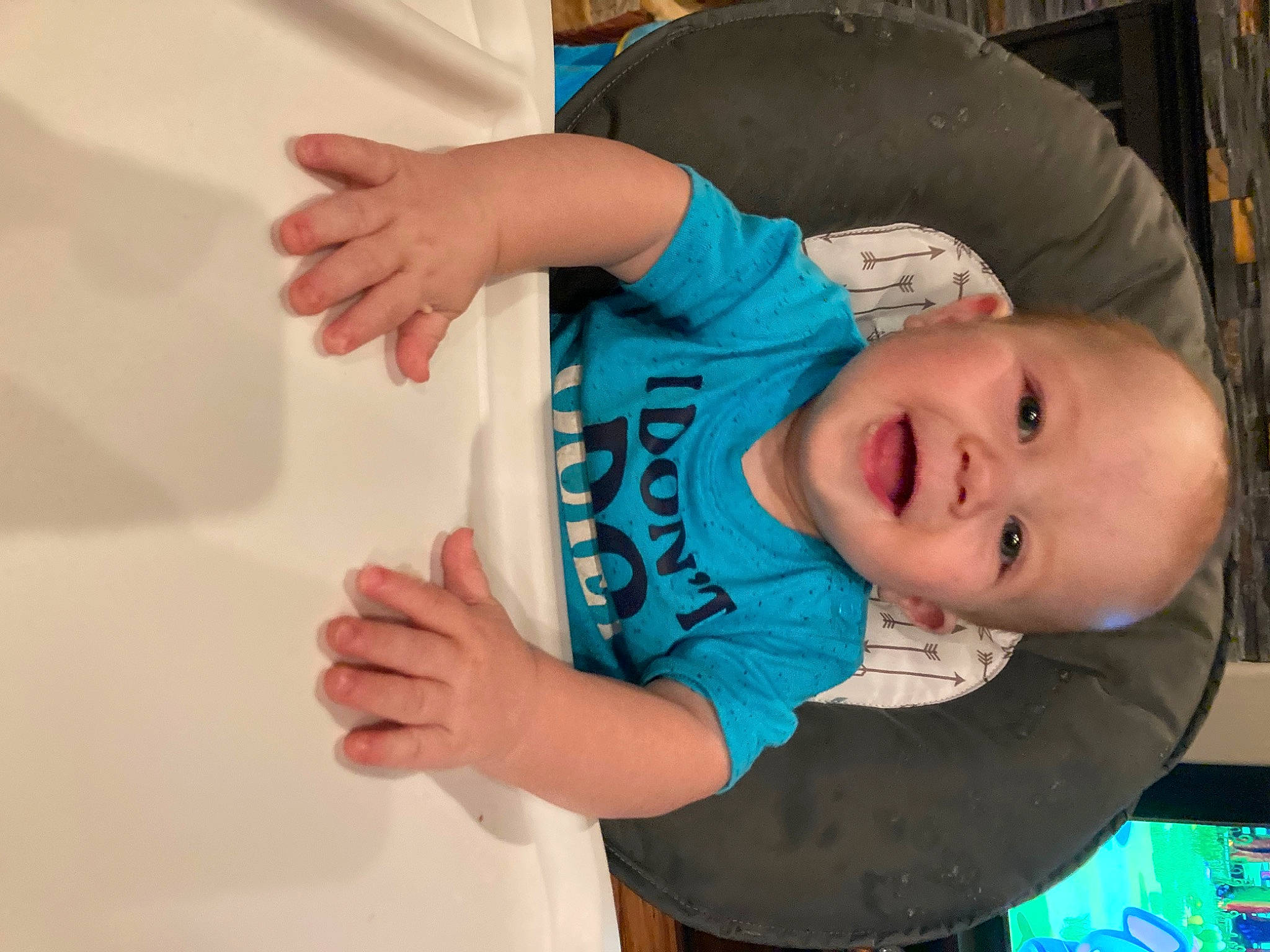 Kaidyn joined the competition — help win amazing prizes! arm, baby, baby_products, baby_toddler_clothing, cheek, child, electric_blue, finger, fun, gesture, hand, happy, human_body, mouth, person, sitting, skin, sleeve, smile, t_shirt