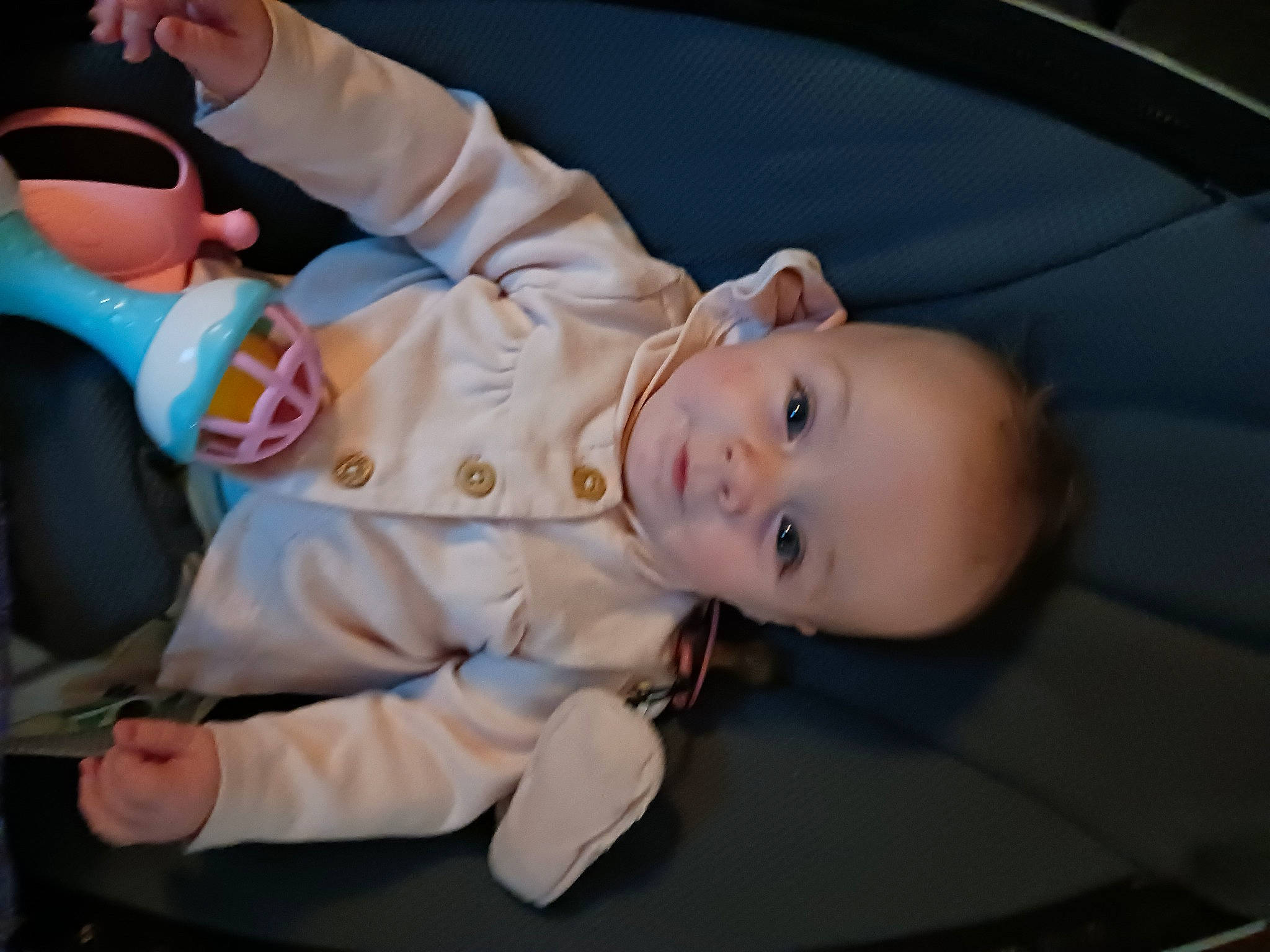 Bekka is registered to the contest to win money with this photo: baby, baby_carriage, baby_products, baby_toddler_clothing, car_seat, cheek, child, comfort, fun, hat, person, personal_luxury_car, sitting, smile, toddler