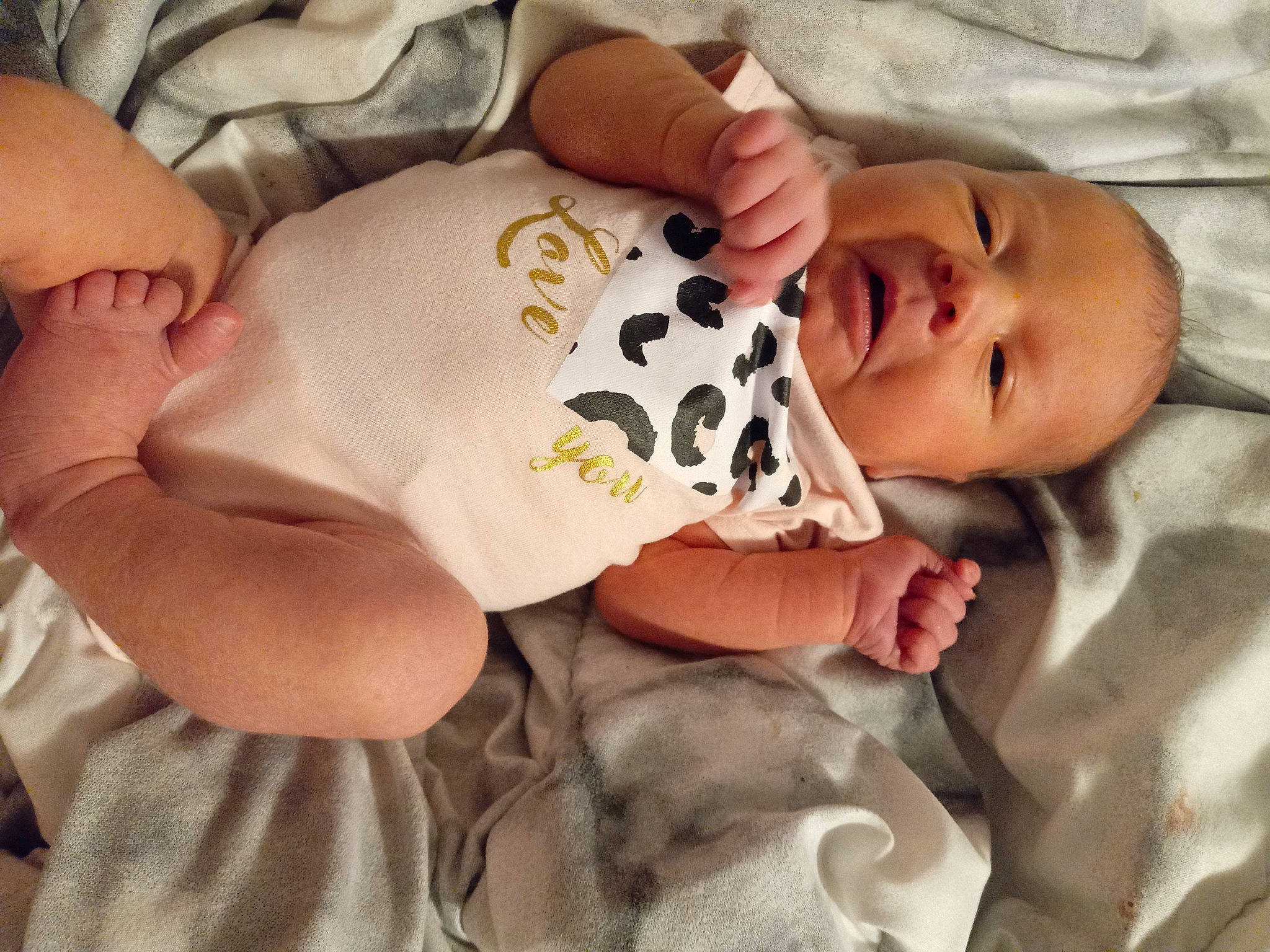 Addelyn joined the competition — help win amazing prizes! baby, baby_products, baby_sleeping, baby_toddler_clothing, bedtime, cheek, child, comfort, eye, eyebrow, finger, head, linens, mouth, pattern, person, skin, sleeve, smile, toddler