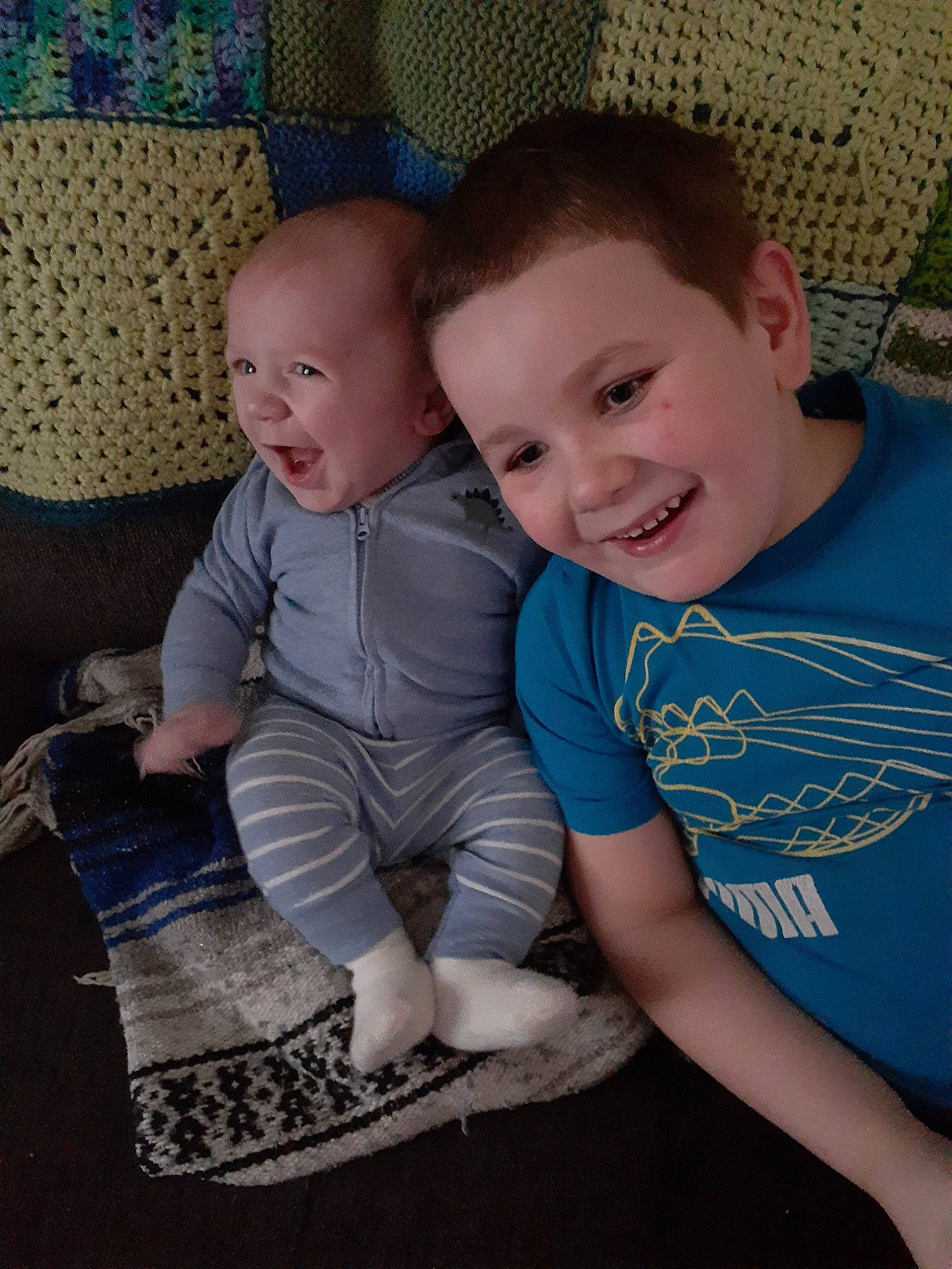 Greyson is registered to the contest to win money with this photo: arm, baby, cheek, child, eye, face, family, fun, head, iris, joy, leg, people, person, play, product, sibling, sitting, skin, smile