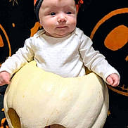 October joined the competition — help win amazing prizes! baby, pumpkin, halloween, headband, white_clothing, orange, black_background, stars, jack_o_lantern, hollow_pumpkin, infant, costume, cute, holiday, decor, face, sitting, child, portrait, festive