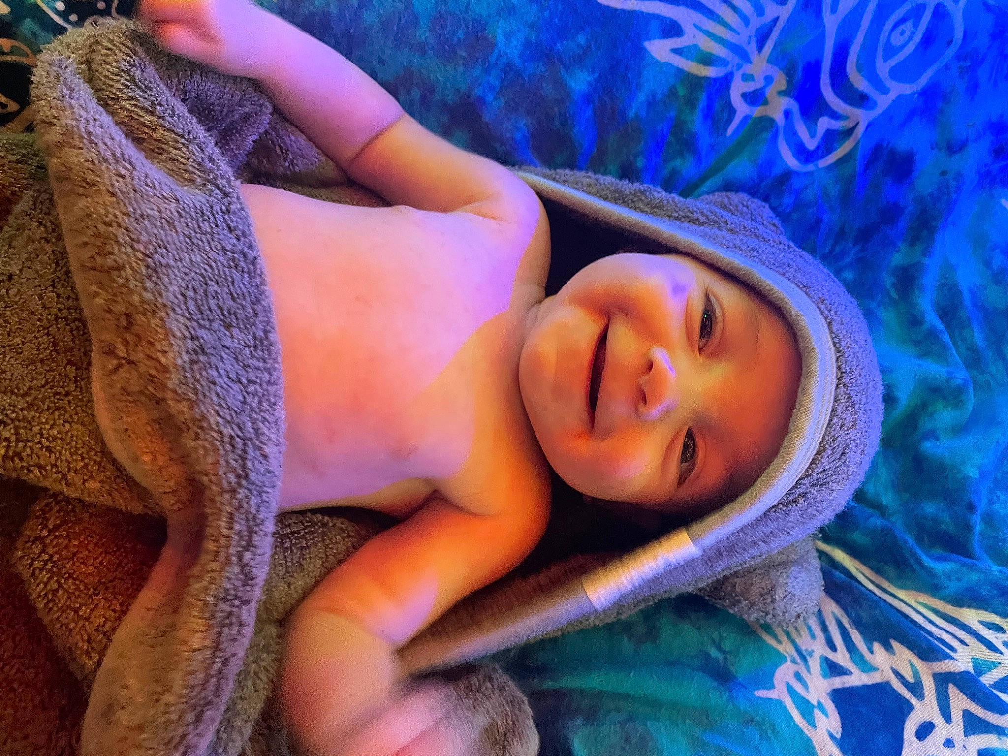 Iona is registered to the contest to win money with this photo: black_hair, blue, electric_blue, eye, eyebrow, eyelash, flash_photography, grass, hairstyle, happy, headwear, joy, leisure, lip, long_hair, magenta, mouth, person, plant, purple