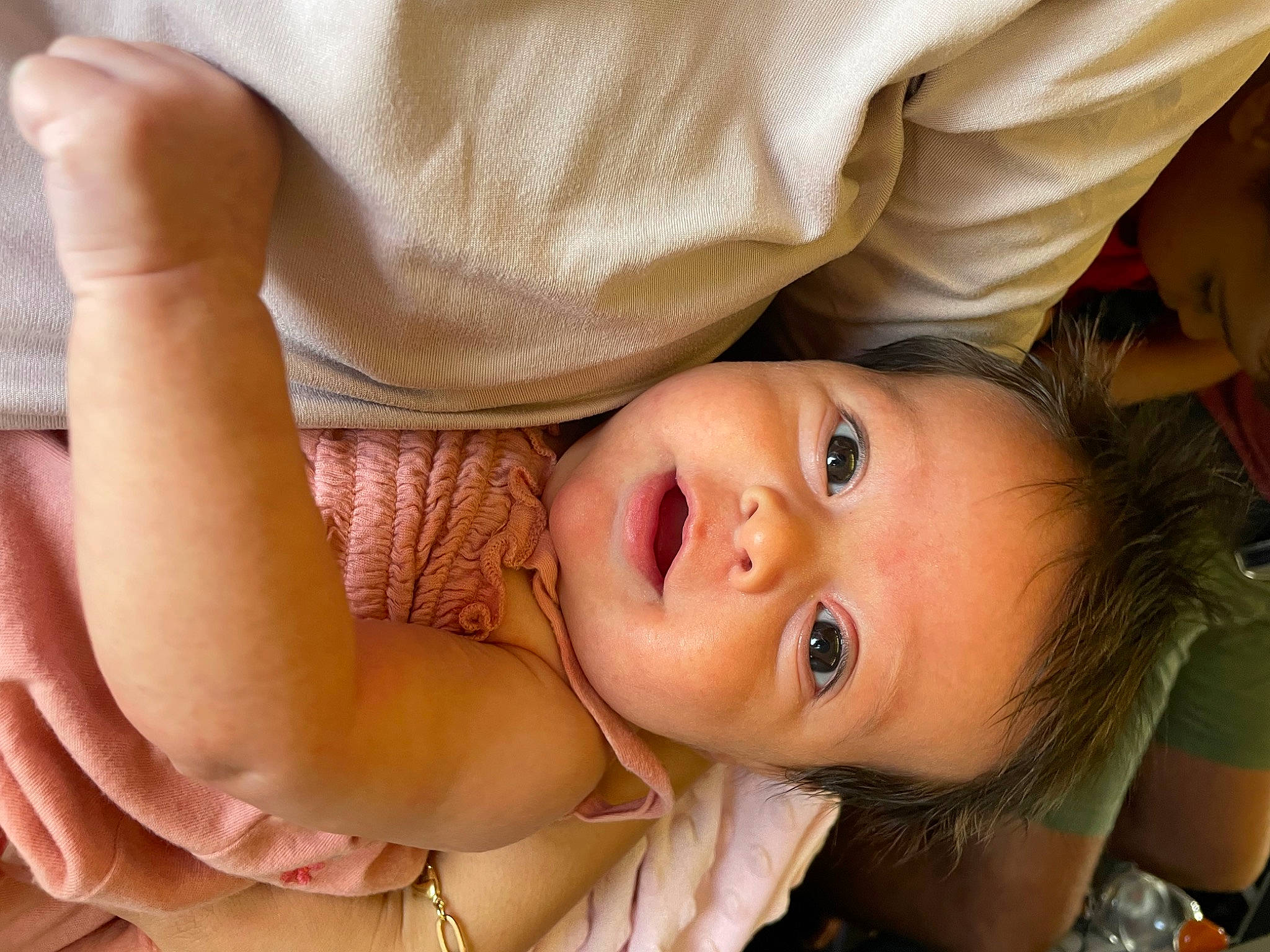 Jasmine is registered to the contest to win money with this photo: baby, cheek, dress, eyebrow, eyelash, finger, flash_photography, gesture, hand, happy, hat, human_body, iris, lip, mouth, neck, nose, person, skin, smile