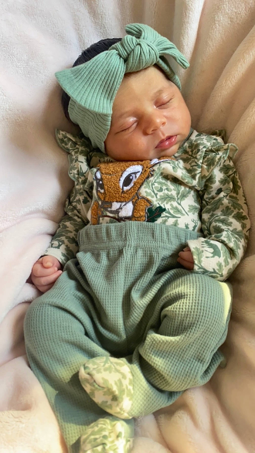 Valentina is registered to the contest to win money with this photo: baby, baby_products, baby_sleeping, baby_toddler_clothing, beanie, cap, cheek, child, comfort, headgear, headwear, knit_cap, linens, pattern, person, personal_protective_equipment, sitting, skin, sleeve, textile