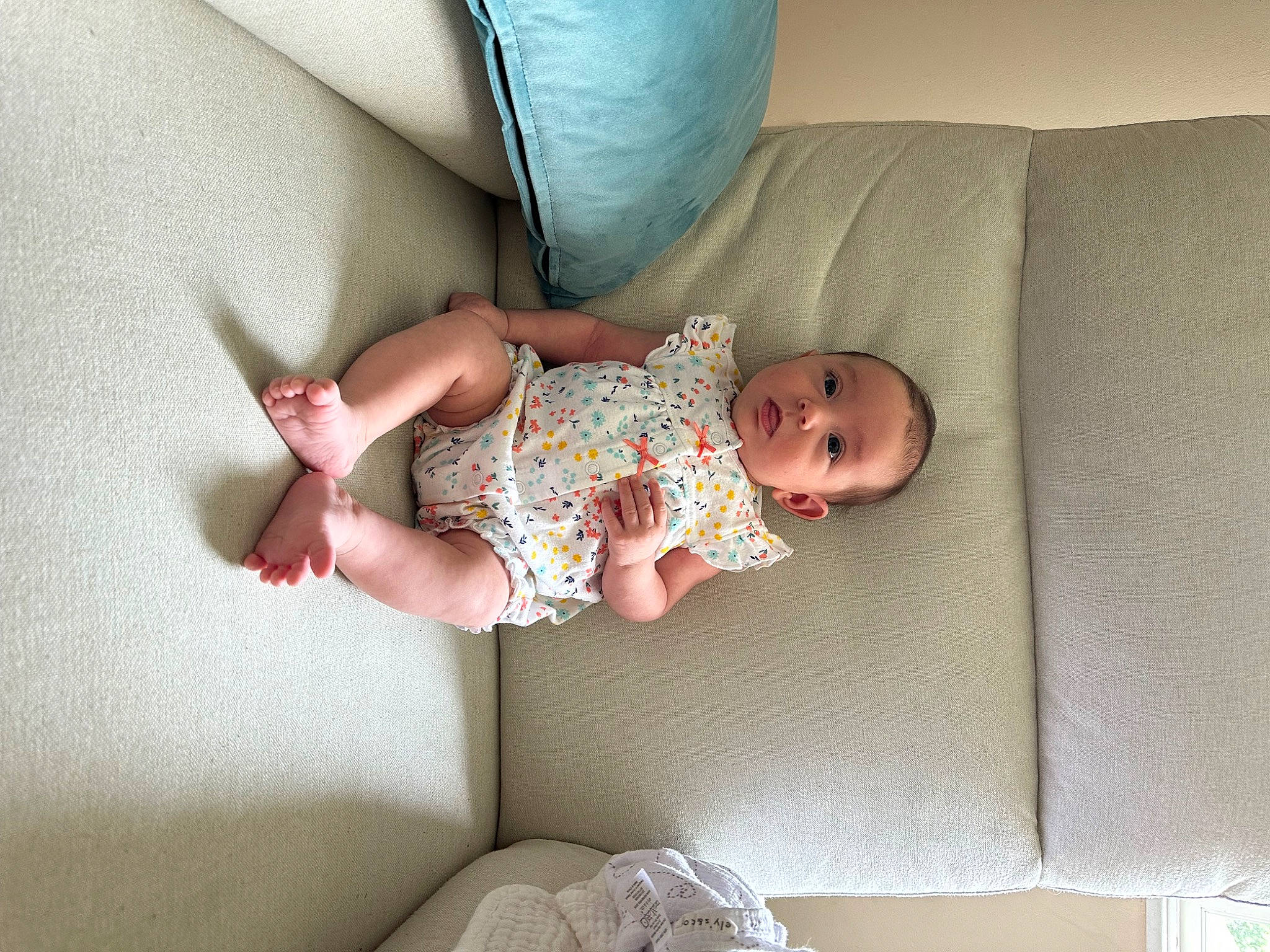 Emersyn joined the competition — help win amazing prizes! baby, baby_toddler_clothing, child, comfort, eye, face, finger, hand, head, human_body, human_leg, knee, leg, linens, pattern, person, skin, sleeve, textile, toddler