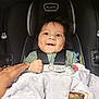 baby, car_seat, blanket, hand, smile, child, infant, clothing, straps, safety, cute, dimple, face, person, indoors, comfort, soft_texture, pacifier, evenflo, sensor_safe
