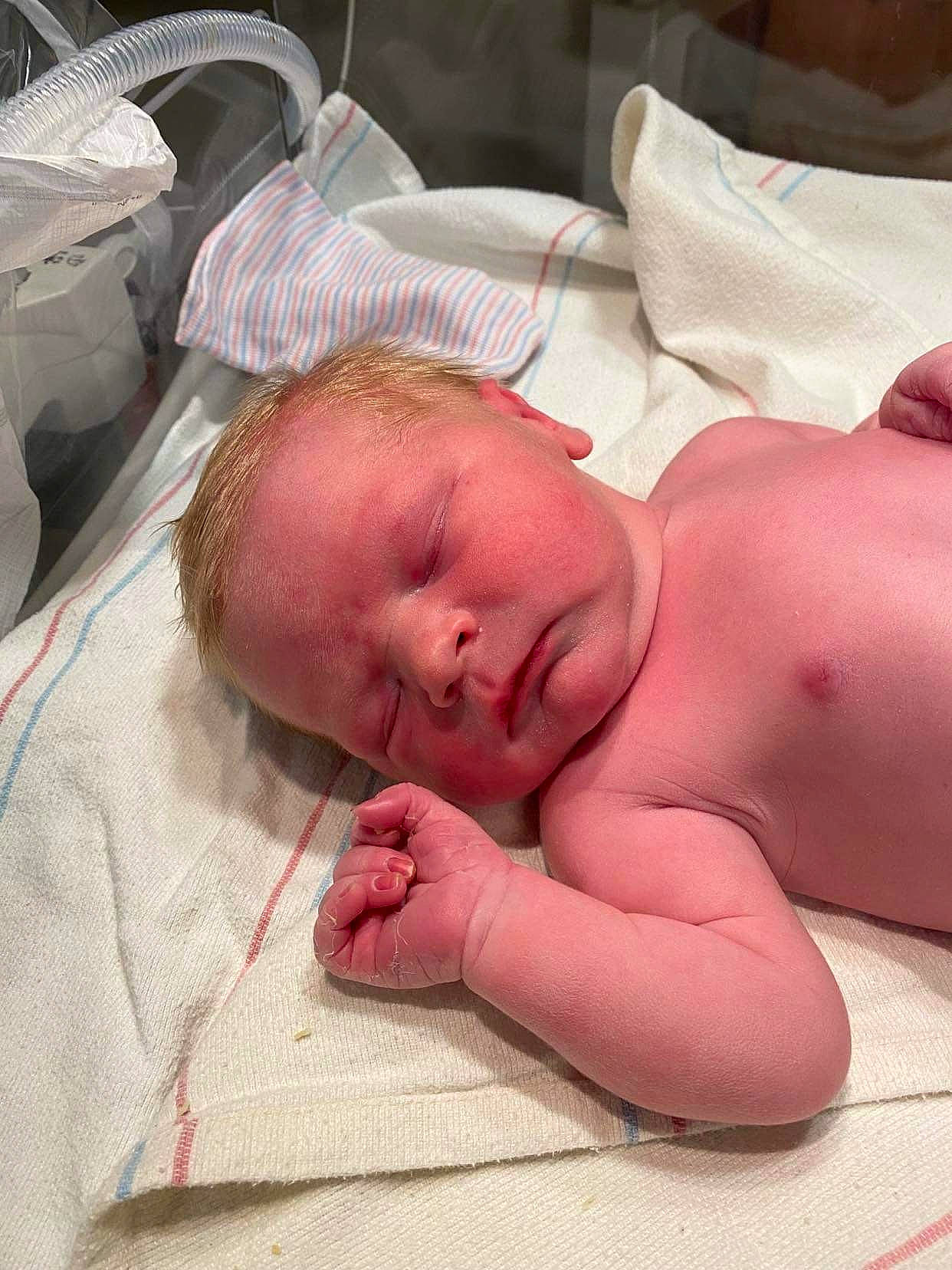 Carter joined the competition — help win amazing prizes! baby, bedding, bedtime, cheek, chest, child, childbirth, comfort, event, finger, head, linens, mouth, nose, person, room, service, skin, textile, thumb