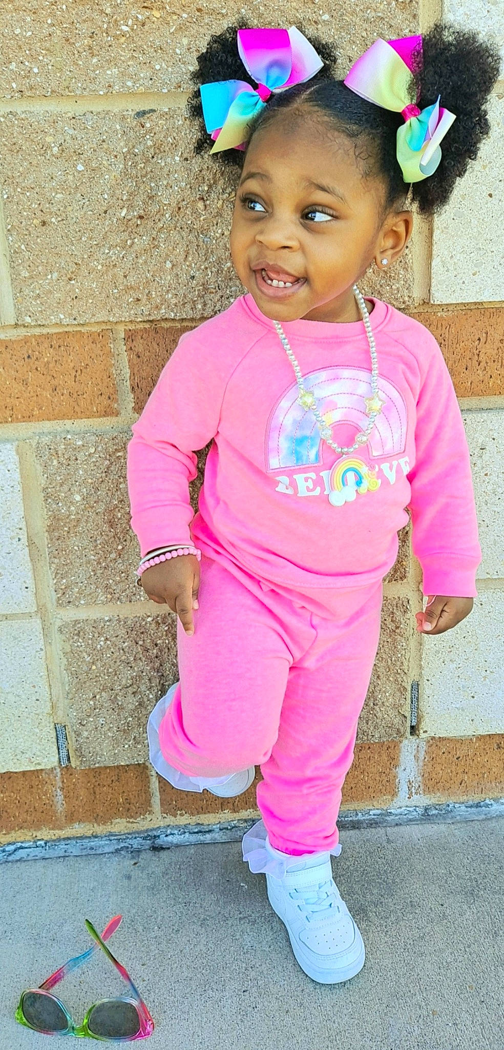 Joy joined the competition — help win amazing prizes! active_pants, baby_toddler_clothing, blue, cheek, clothing, cool, happy, headgear, joy, magenta, neck, outerwear, person, pink, purple, sleeve, smile, snapshot, standing, t_shirt