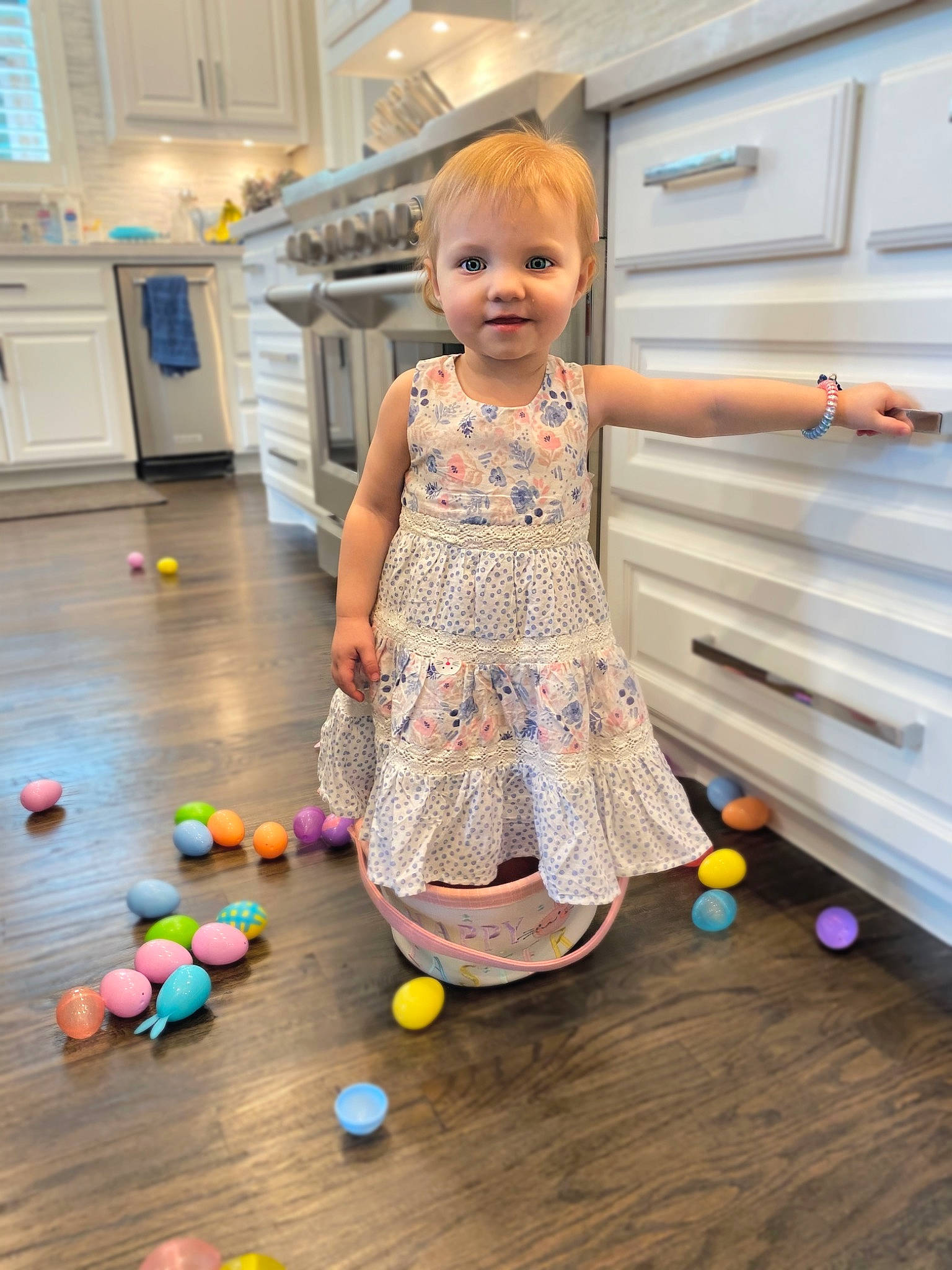 Harleigh is registered to the contest to win money with this photo: child, dress, easter, floor, person, play, room, toddler, yellow