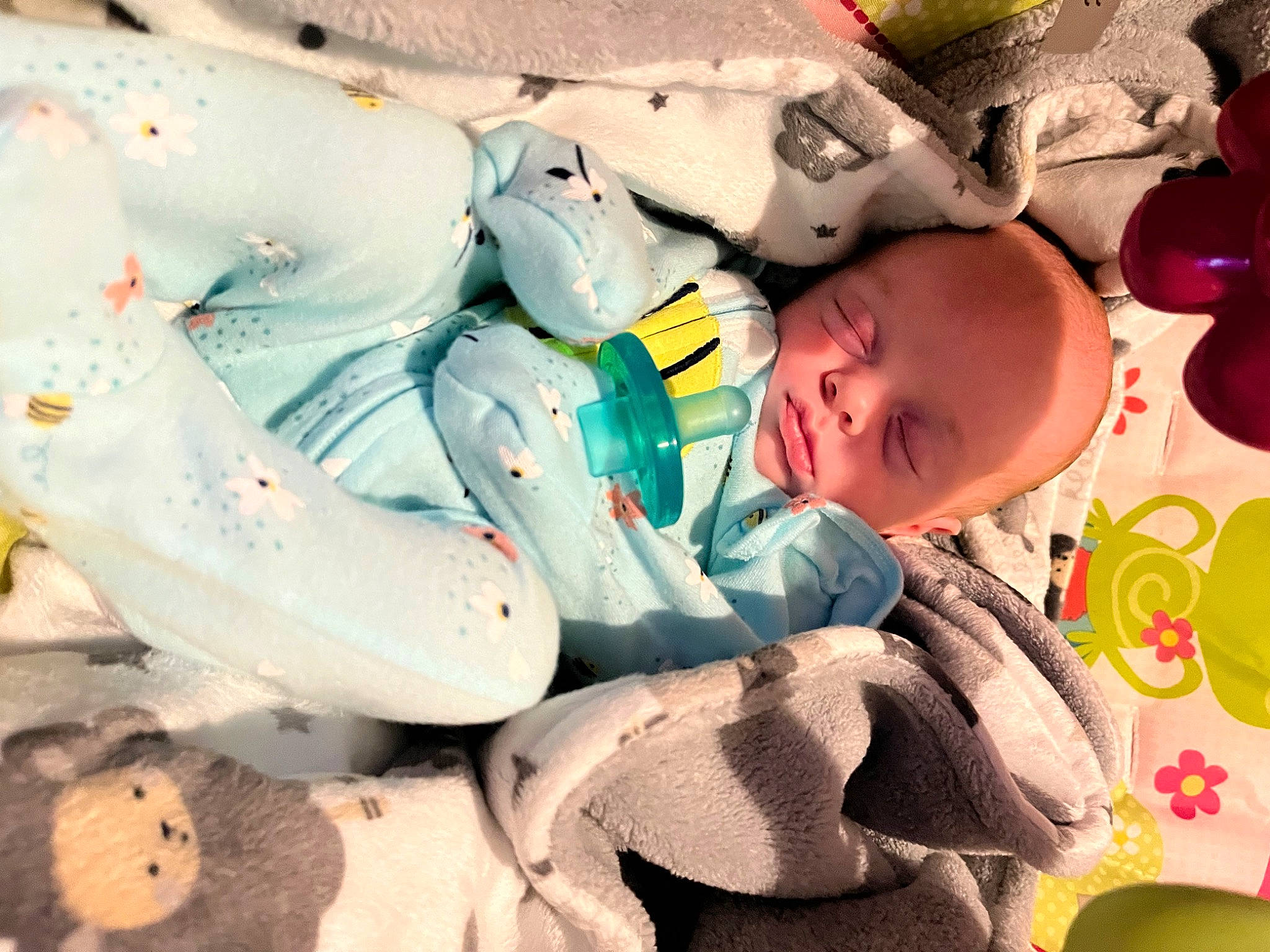 Bliss is registered to the contest to win money with this photo: baby, baby_carriage, baby_products, baby_toddler_clothing, bedtime, carmine, cheek, child, comfort, fun, happy, head, linens, nap, pattern, person, plastic, product, room, sleep