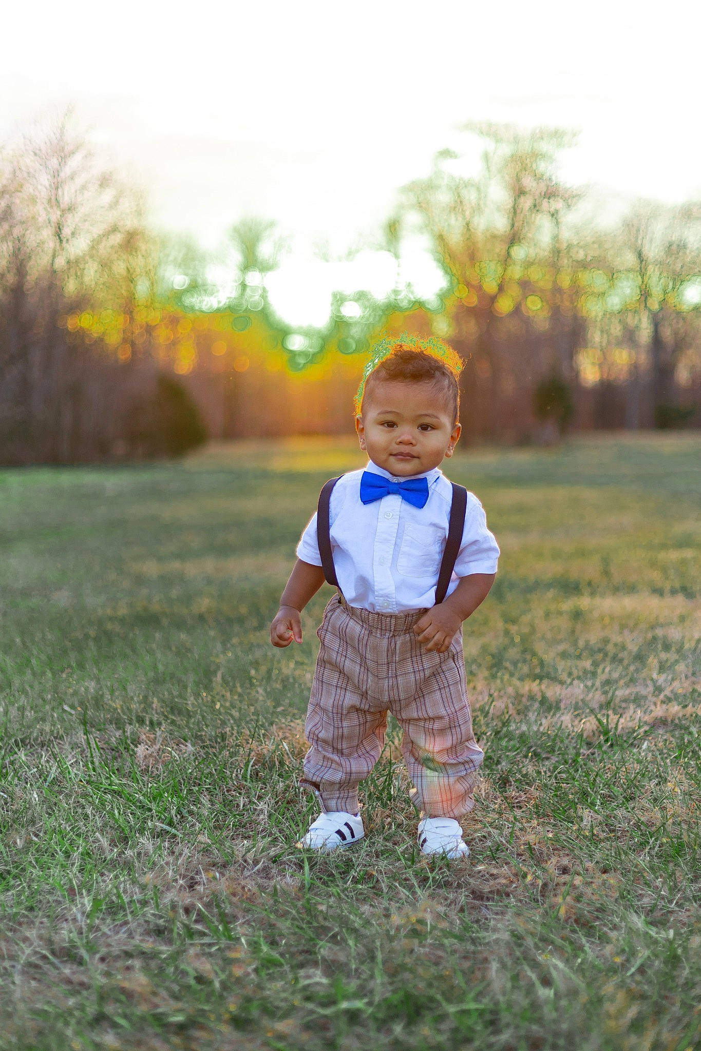 Aavash is registered to the contest to win money with this photo: baby, baby_toddler_clothing, ball, child, field, flash_photography, grass, grassland, happy, landscape, leisure, meadow, people_in_nature, person, plant, prairie, recreation, sky, toddler, tree