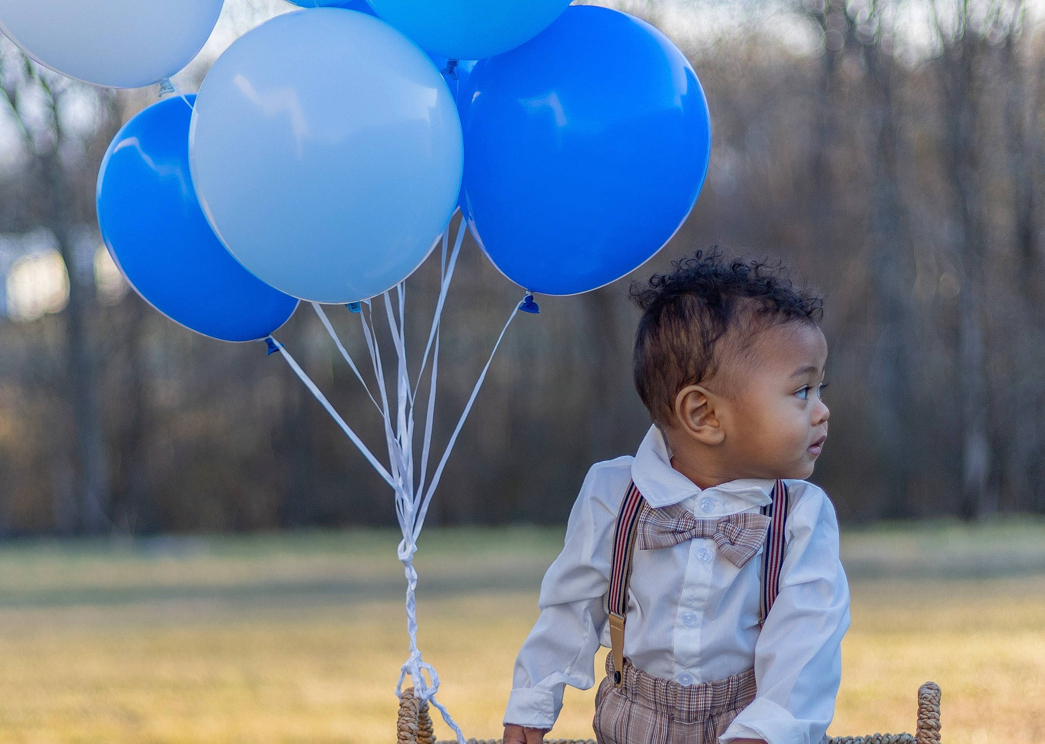 Aavash joined the competition — help win amazing prizes! baby, balloon, blue, clothing, electric_blue, event, fun, grass, happy, leisure, light, morning, party_supply, people_in_nature, person, photograph, recreation, snapshot, toddler, tree