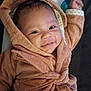 Yo'Shon joined the competition — help win amazing prizes! baby, smiling, hooded_towel, infant, cozy, child, cute, portrait, raised_arm, happy, face, skin, clothing, indoors, blanket, comfort, young_child, expression, wrapped, toddler