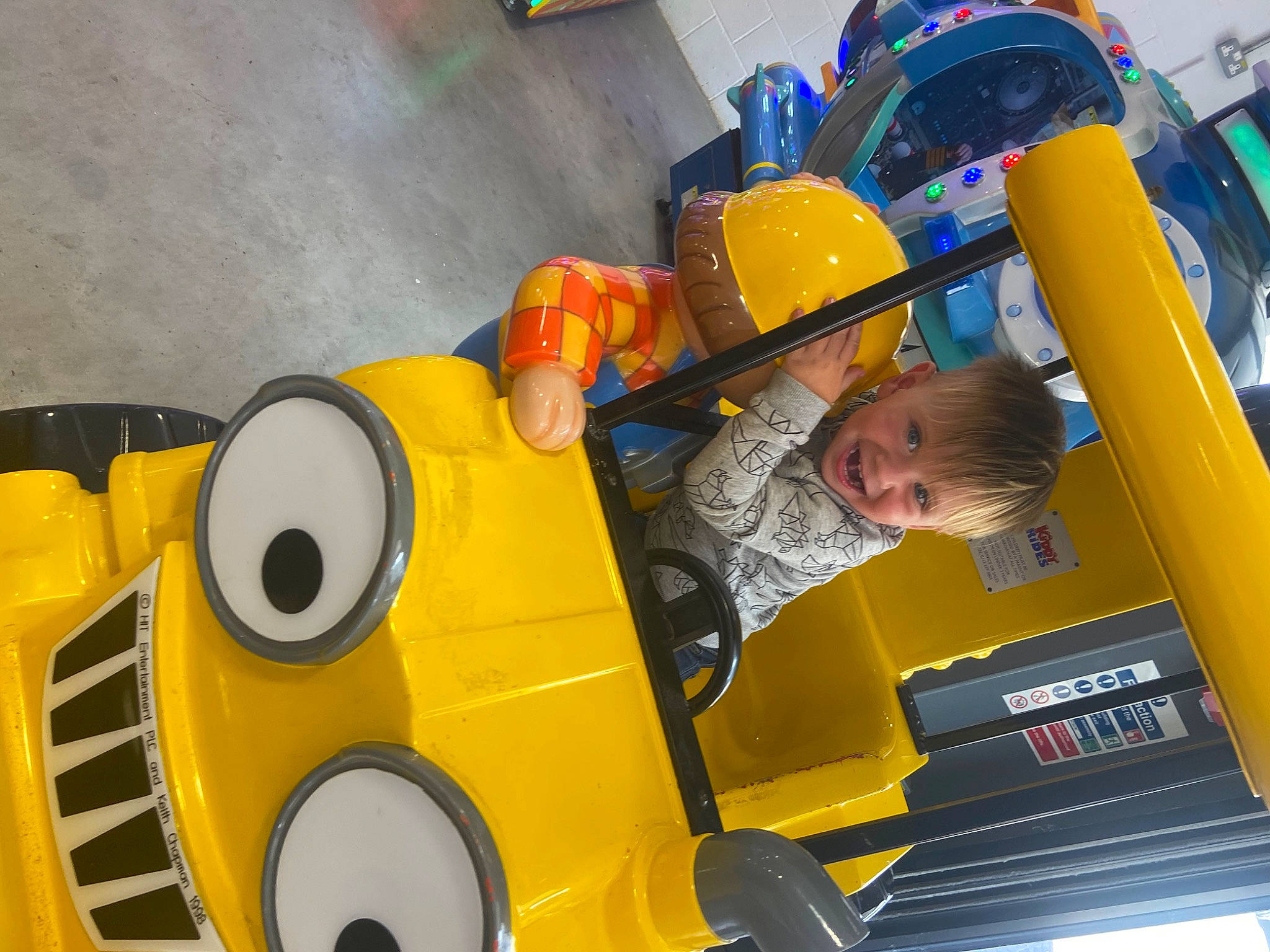 Billy joined the competition — help win amazing prizes! auto_part, automotive_design, automotive_exterior, automotive_tire, automotive_wheel_system, chute, electric_blue, fictional_character, fun, helmet, joy, leisure, machine, motor_vehicle, person, personal_protective_equipment, plastic, playground, recreation, toddler