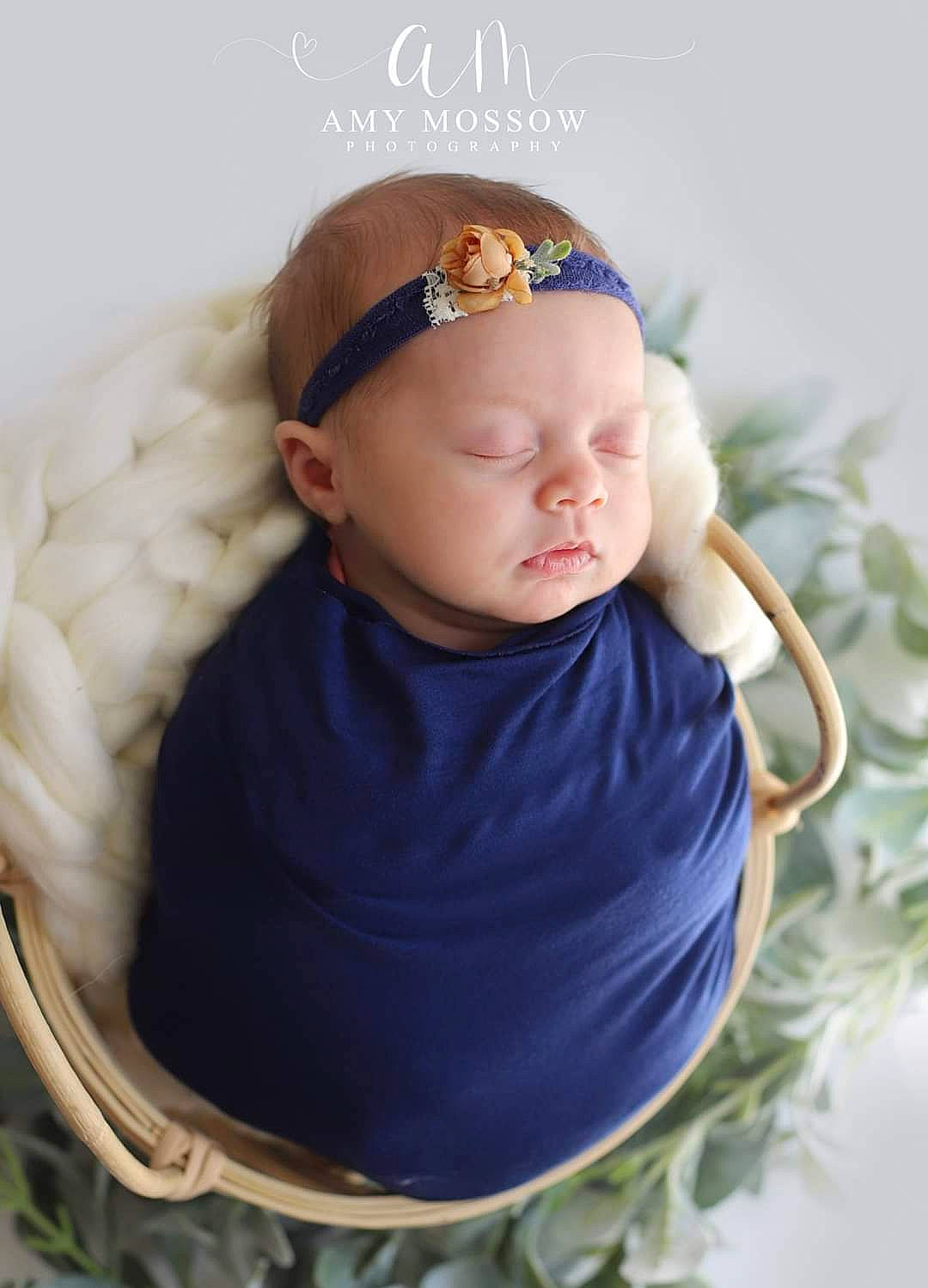 Gianna is registered to the contest to win money with this photo: arm, baby, baby_toddler_clothing, beanie, cap, child, costume_hat, electric_blue, eye, fashion_accessory, goggles, grass, happy, hat, headband, headpiece, headwear, human_body, jewellery, person