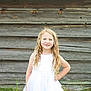 blonde, child, clothing, dress, eveningdress, face, fashion, female, formalwear, girl, gown, hair, happy, head, person, photography, portrait, wedding, weddinggown, wood