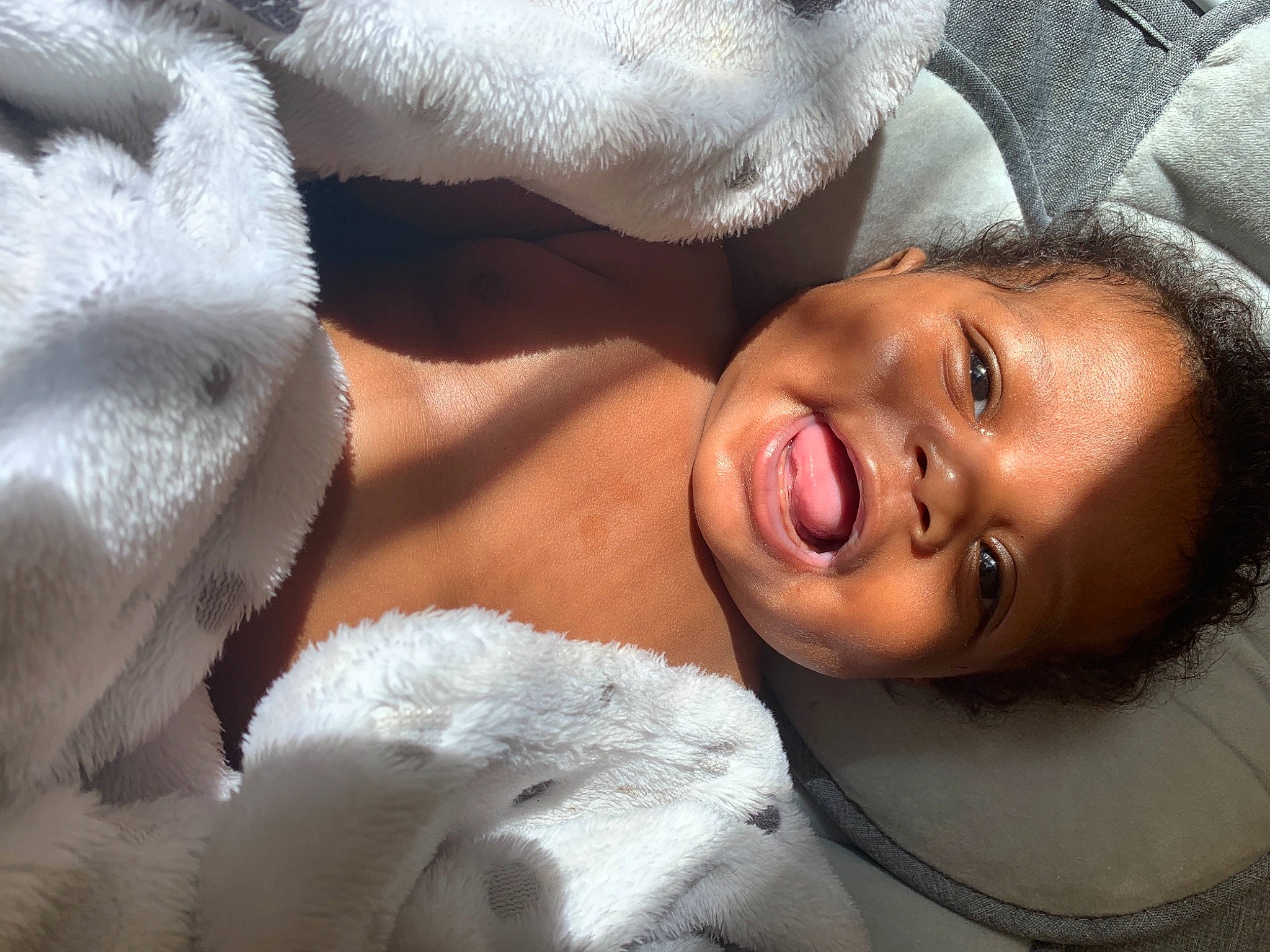 Ramere is registered to the contest to win money with this photo: abdomen, cheek, child, chin, comfort, eyebrow, eyelash, face, finger, gesture, happy, iris, lip, mouth, neck, nose, person, skin, smile, textile