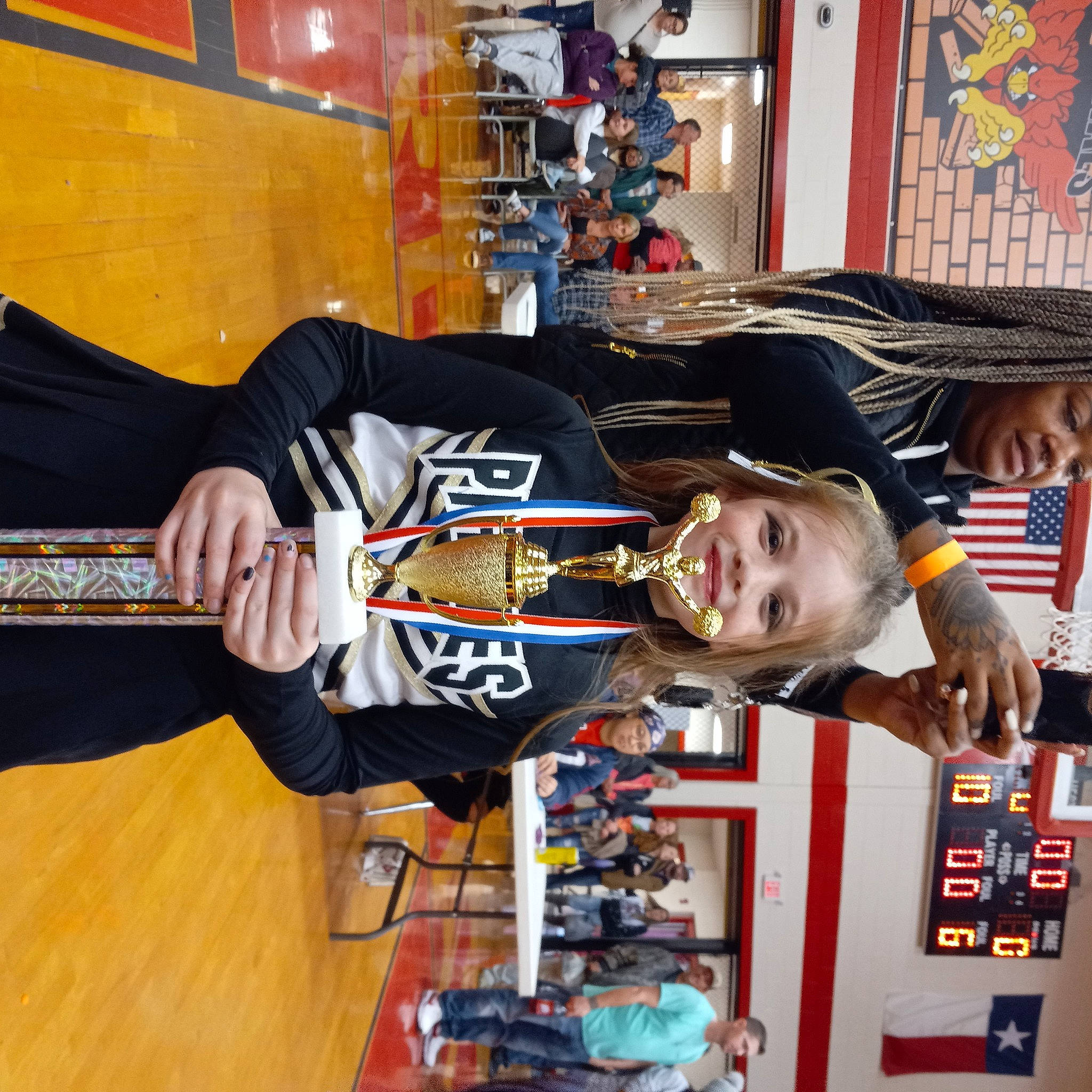 Kyleigh is registered to the contest to win money with this photo: collection, hardwood, headwear, joy, machine, person, room, sportswear, t_shirt, wood