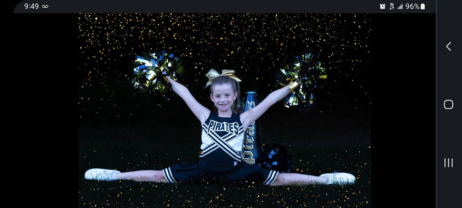 Kyleigh is registered to the contest to win money with this photo: astronomical_object, black, christmas_decoration, christmas_eve, darkness, electric_blue, event, flash_photography, font, fun, gesture, grass, happy, holiday, joy, midnight, night, people_in_nature, person, sitting