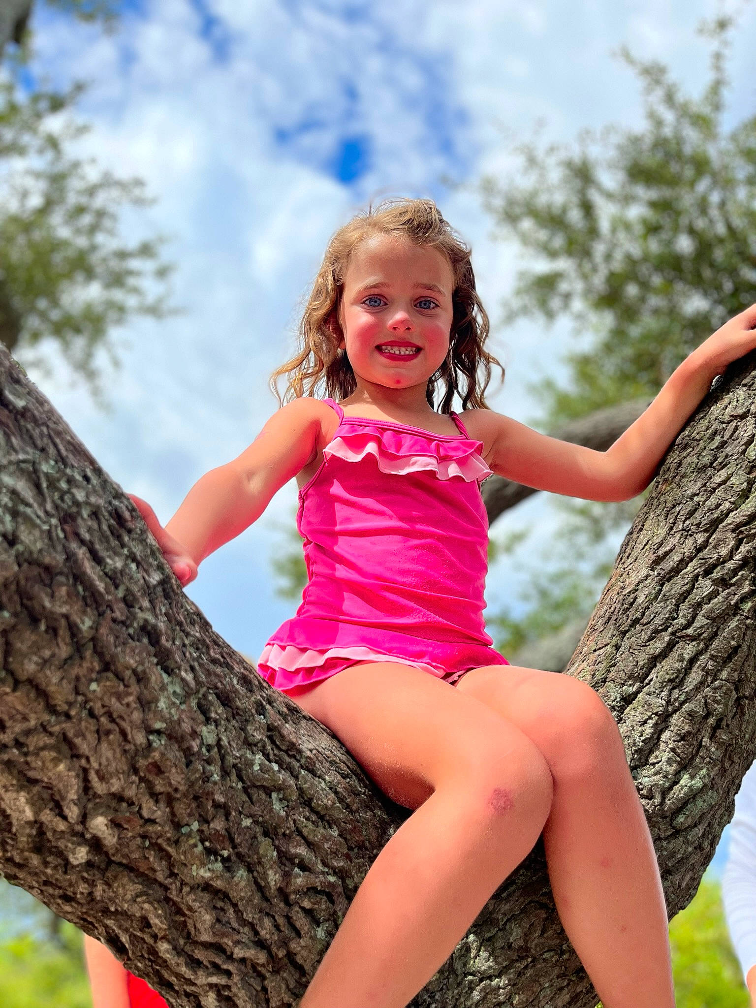 Harley is registered to the contest to win money with this photo: cloud, dress, flash_photography, fun, grass, happy, human_body, joy, leg, leisure, muscle, people_in_nature, person, pink, plant, sky, smile, summer, thigh, tree