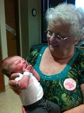 Kiley is registered to the contest to win money with this photo: arm, baby, cheek, chin, comfort, ear, eye, eyewear, facial_expression, finger, gesture, glasses, hair, iris, joy, mammal, mouth, nose, organ, person