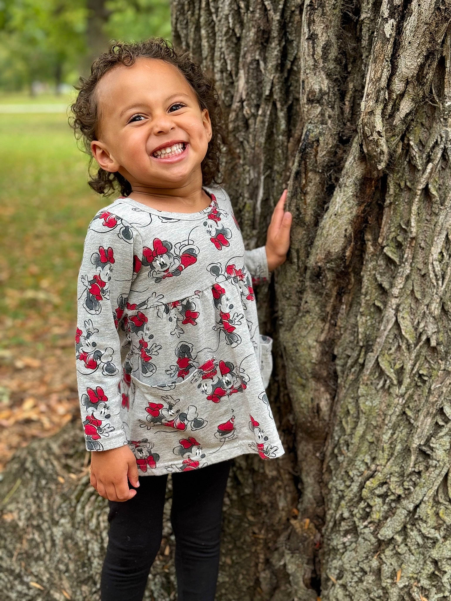 Brooklynn joined the competition — help win amazing prizes! arm, beauty, eye, face, flash_photography, grass, happy, head, joy, people_in_nature, person, plant, sleeve, smile, t_shirt, toddler, tree, trunk, waist, wood
