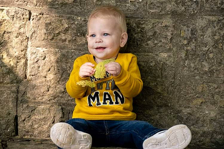 Jordan is registered to the contest to win money with this photo: baby_toddler_clothing, cheek, eye, face, flash_photography, footwear, grass, happy, head, human, joy, leg, people_in_nature, person, shoe, smile, sneakers, standing, t_shirt, toddler