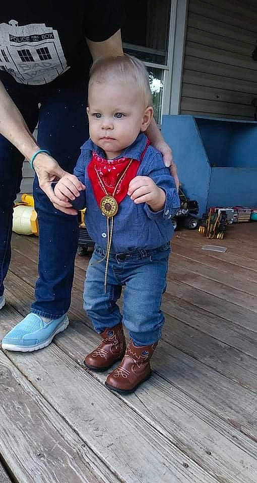 Jordan joined the competition — help win amazing prizes! baby_toddler_clothing, blue, child, denim, electric_blue, eye, flooring, footwear, fun, hardwood, head, human_leg, jeans, leg, outdoor_shoe, person, shoe, sitting, sneakers, toddler