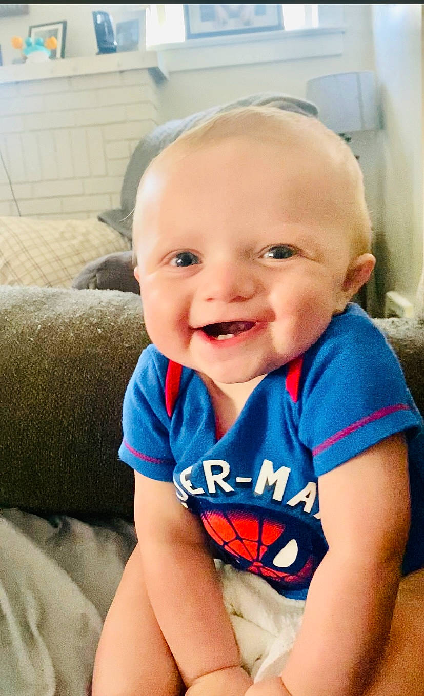 Brady joined the competition — help win amazing prizes! azure, baby_toddler_clothing, cheek, chin, eyebrow, face, finger, happy, head, human_body, iris, joy, leg, mouth, nose, organ, person, plant, skin, sleeve