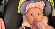Giavanna joined the competition — help win amazing prizes! baby, car_interior, car_seat, child, cozy, cute, expression, hand_in_mouth, headband, indoors, infant, love, pink_clothing, portrait, safety_harness, seatbelt, sitting, snapchat_overlay, wide_eyes, young_child