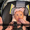 baby, car_interior, car_seat, child, cozy, cute, expression, hand_in_mouth, headband, indoors, infant, love, pink_clothing, portrait, safety_harness, seatbelt, sitting, snapchat_overlay, wide_eyes, young_child