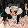 baby, car_seat, heart_shaped_sunglasses, white_hat, pink_blanket, plush_toy, child, infant, cute, wrapped, seatbelt, clothing, accessory, indoors, portrait, serious_face, toy, fabric, protection, babywear