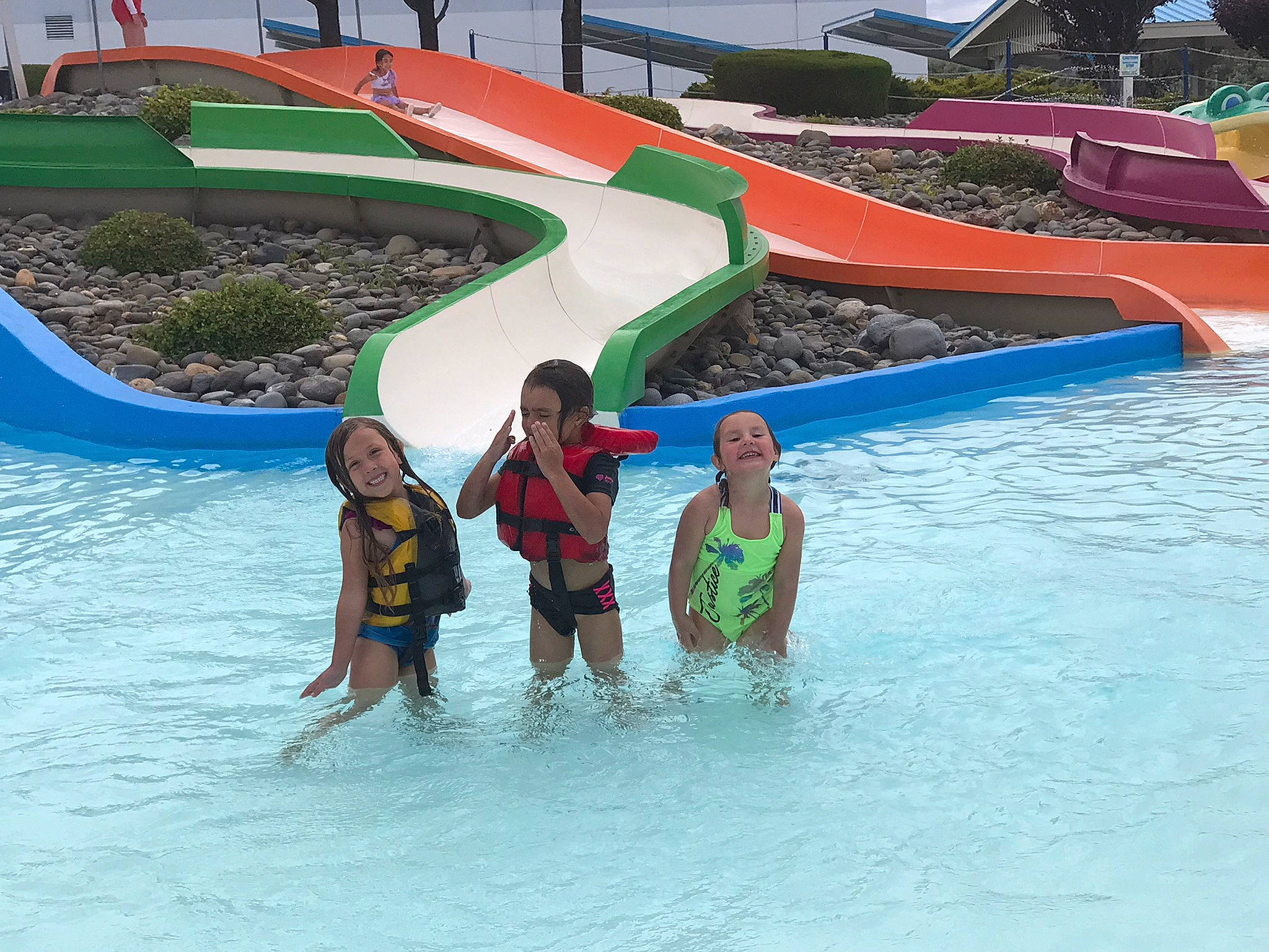 Averie is registered to the contest to win money with this photo: amusement_park, amusement_ride, aqua, child, chute, fun, joy, leisure, leisure_centre, nonbuilding_structure, person, plant, recreation, resort_town, swimming_pool, swimwear, toddler, tourism, travel, vacation