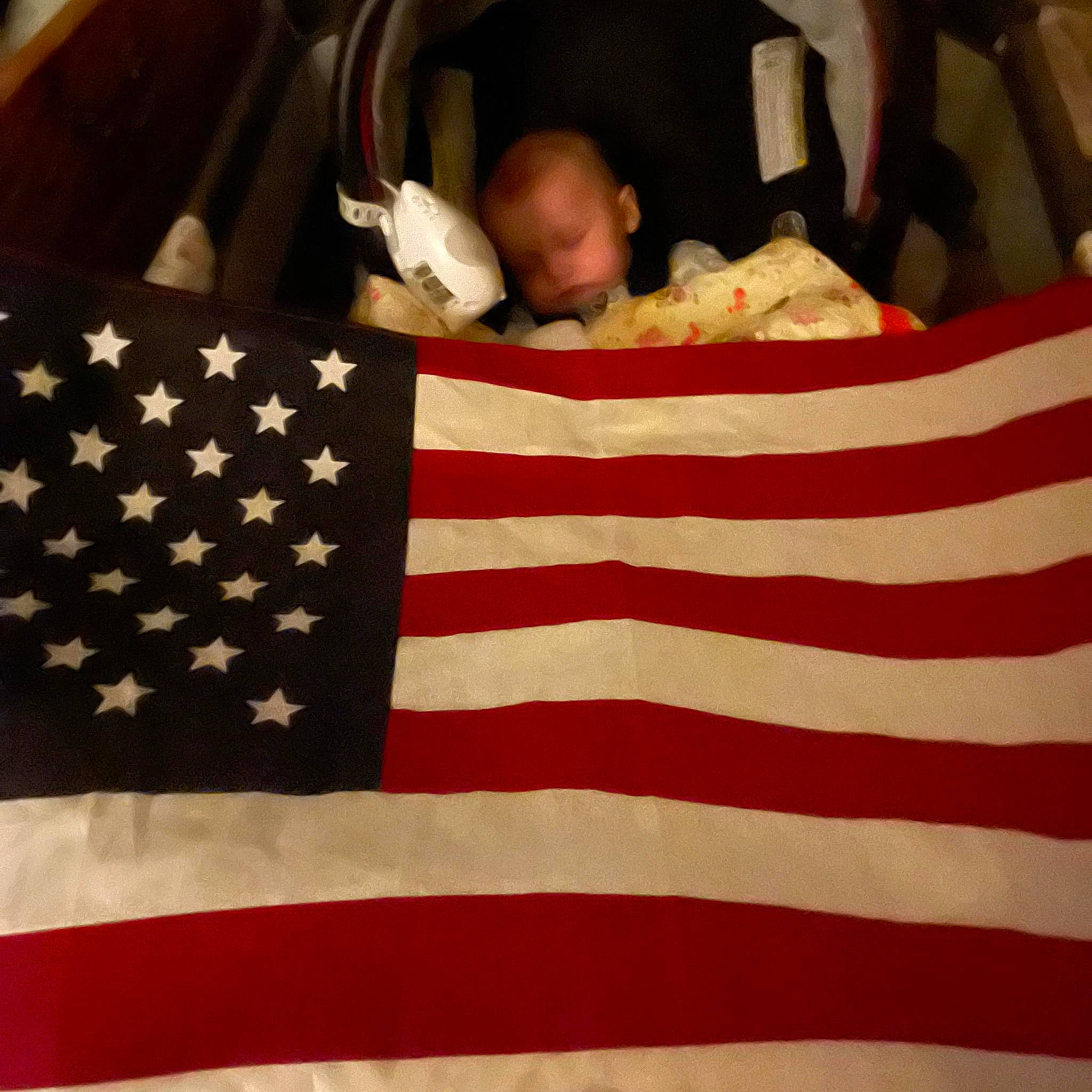 Easton is registered to the contest to win money with this photo: baby, baby_products, baby_safety, baby_sleeping, baby_toddler_clothing, bed, bedding, bedtime, carmine, comfort, cradle, event, flag, flag_day_usa, flag_of_the_united_states, infant_bed, linens, person, room, textile