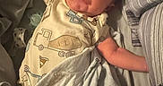 Oliver joined the competition — help win amazing prizes! baby, bed, blanket, child, comfort, cute, fabric, indoor, infant, newborn, onesie, peaceful, portrait, relax, remote_control, resting, sleeping, sleepwear, smile, soft_toy