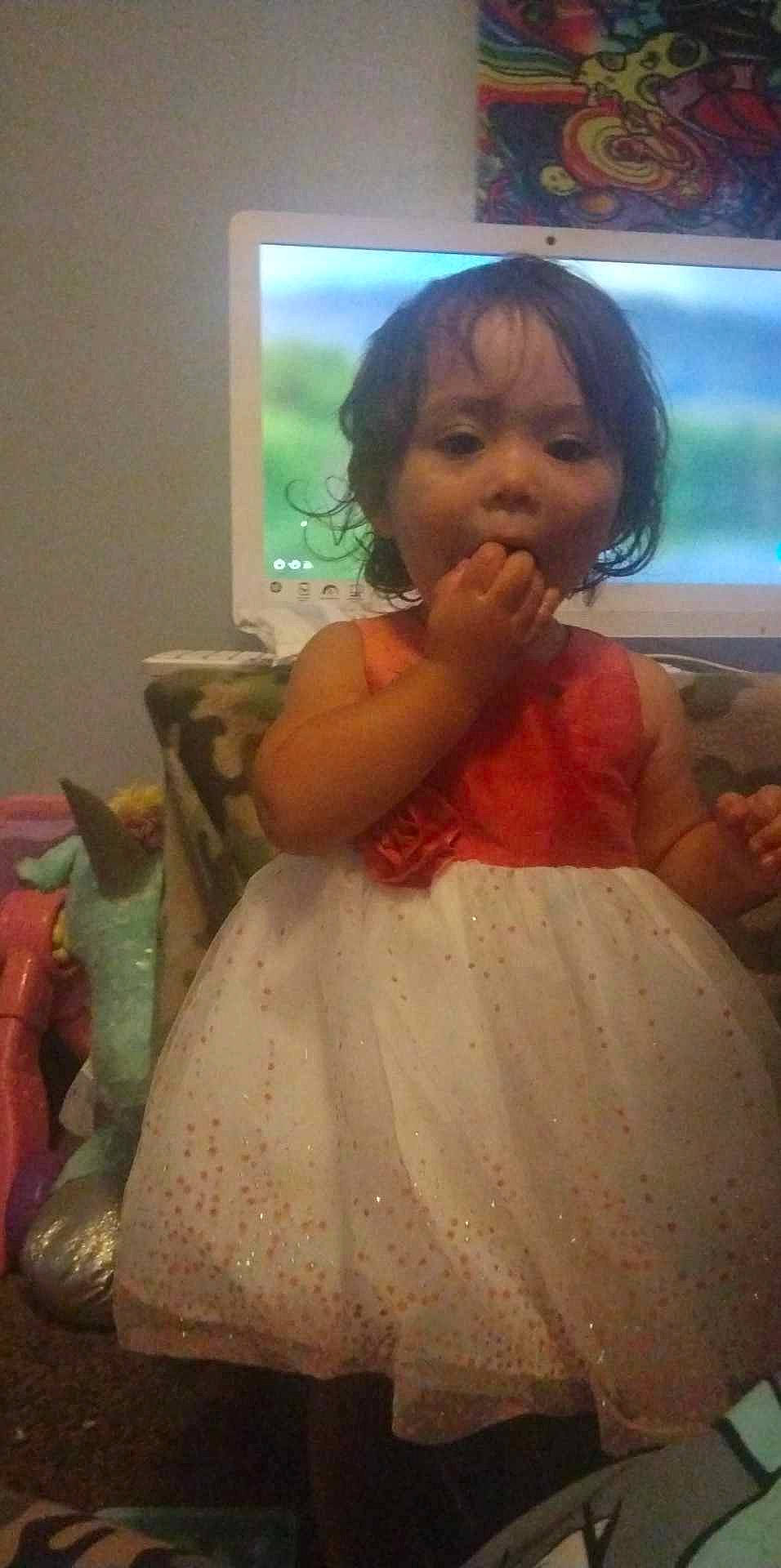 Daniella joined the competition — help win amazing prizes! baby, child, dress, event, eyelash, formal_wear, fun, hair, happy, head, iris, lip, nose, person, room, shoulder, sitting, skin, toddler, vacation