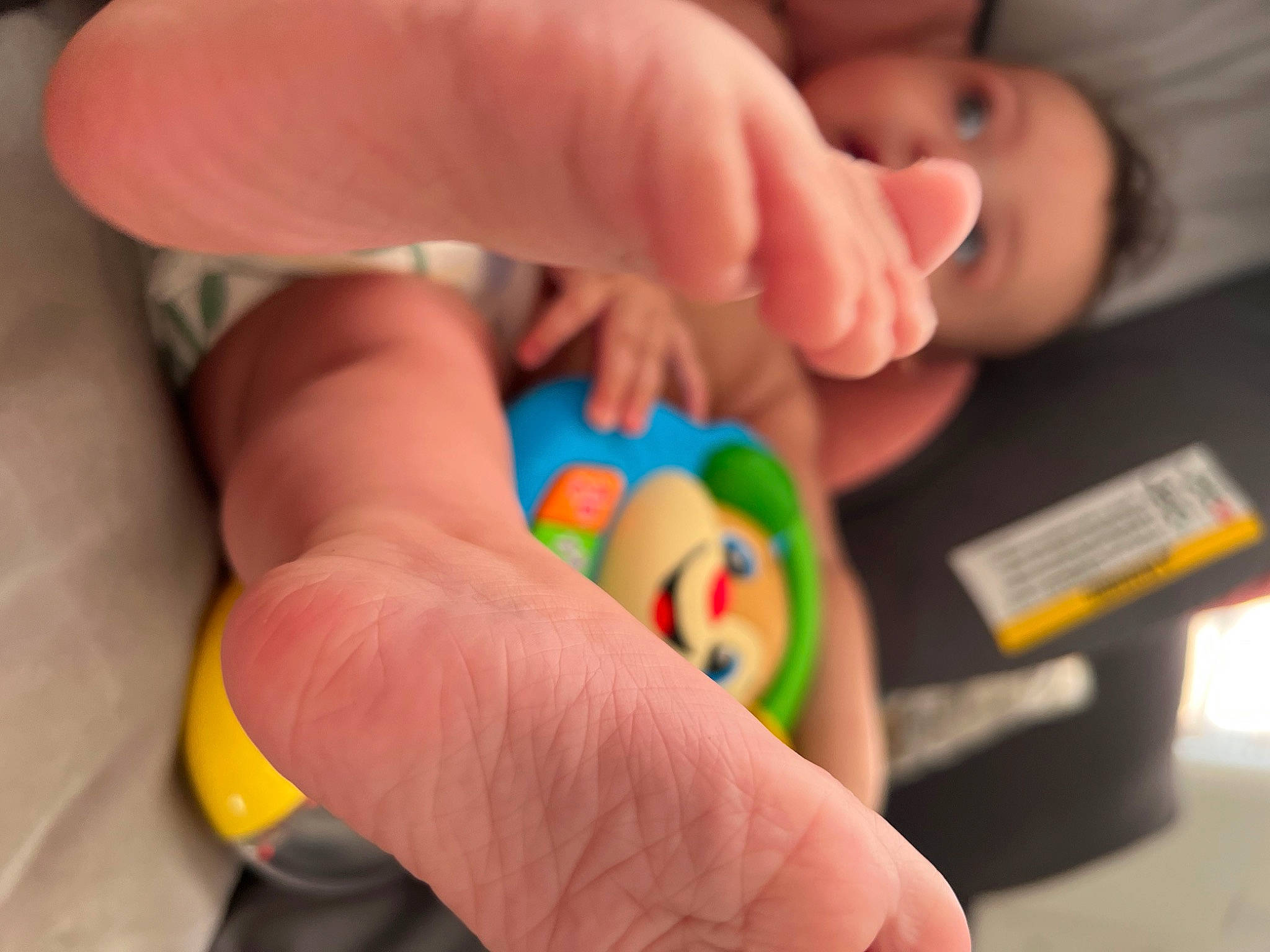 Brinlee Jordan joined the competition — help win amazing prizes! baby, child, circle, finger, foot, gesture, human_leg, nail, pattern, person, plastic, play, sweetness, thumb, toddler, toe, toy, wrist
