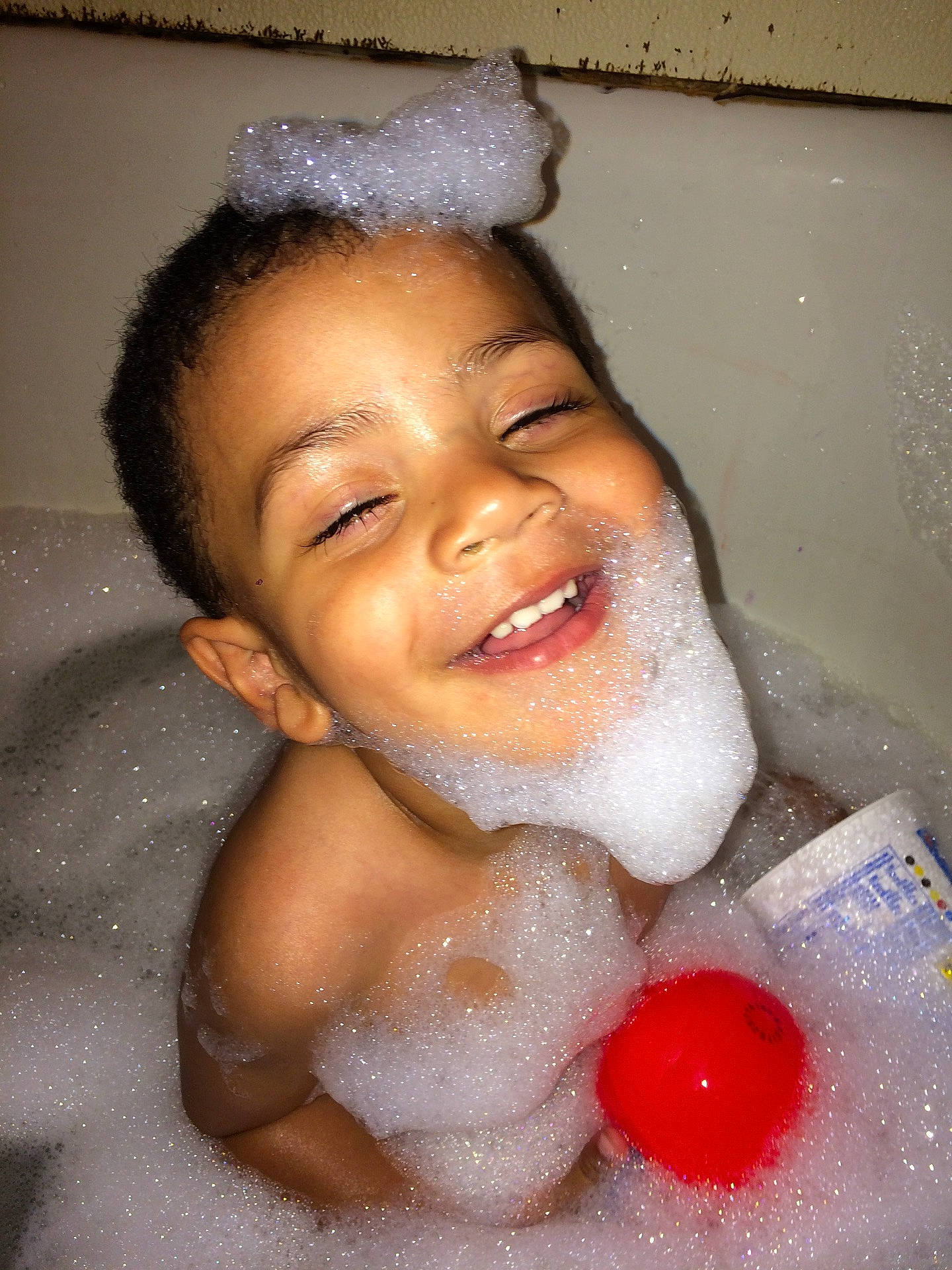 Jayceon is registered to the contest to win money with this photo: bathing, beauty, child, eye, face, finger, girl, hand, head, human_body, image, infant, joy, leg, mouth, nose, organ, person, photography, skin