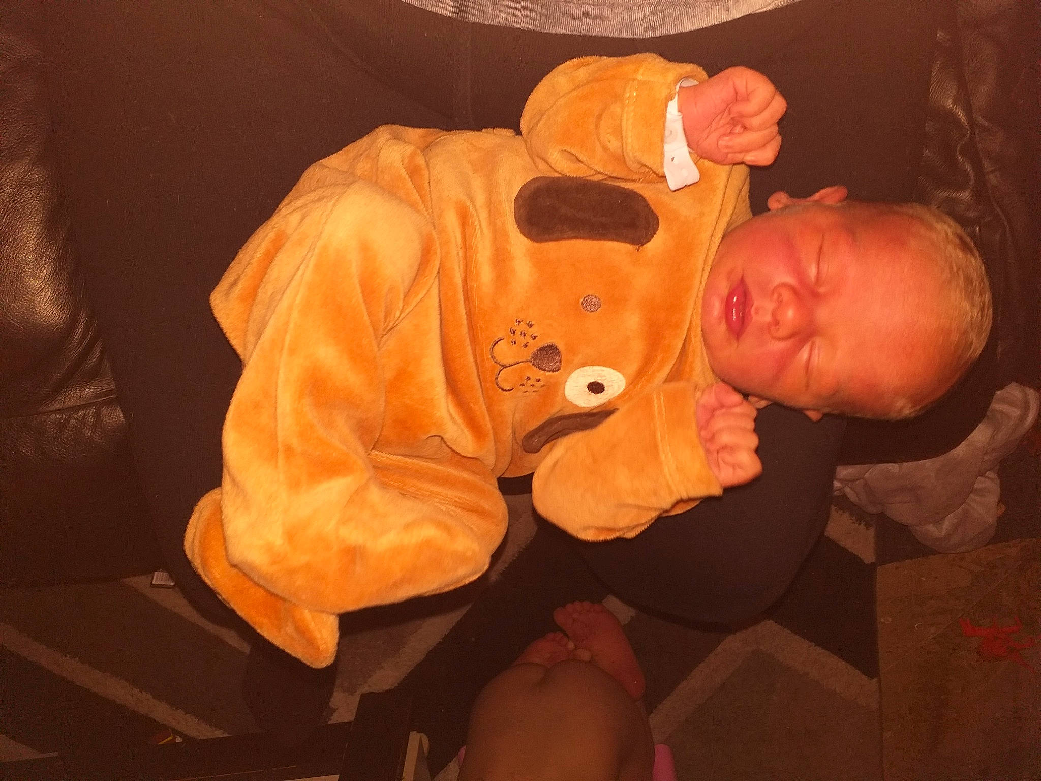 Ajay is registered to the contest to win money with this photo: baby, ear, event, flesh, fun, hat, mouth, orange, person, room, sleeve, toddler, wrinkle