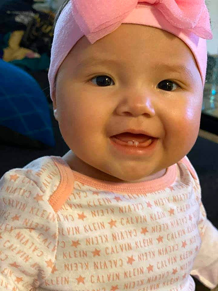 Alison is registered to the contest to win money with this photo: baby, beauty, cheek, child, chin, ear, eye, face, facial_expression, forehead, happy, head, headgear, lip, mouth, nose, person, pink, skin, smile