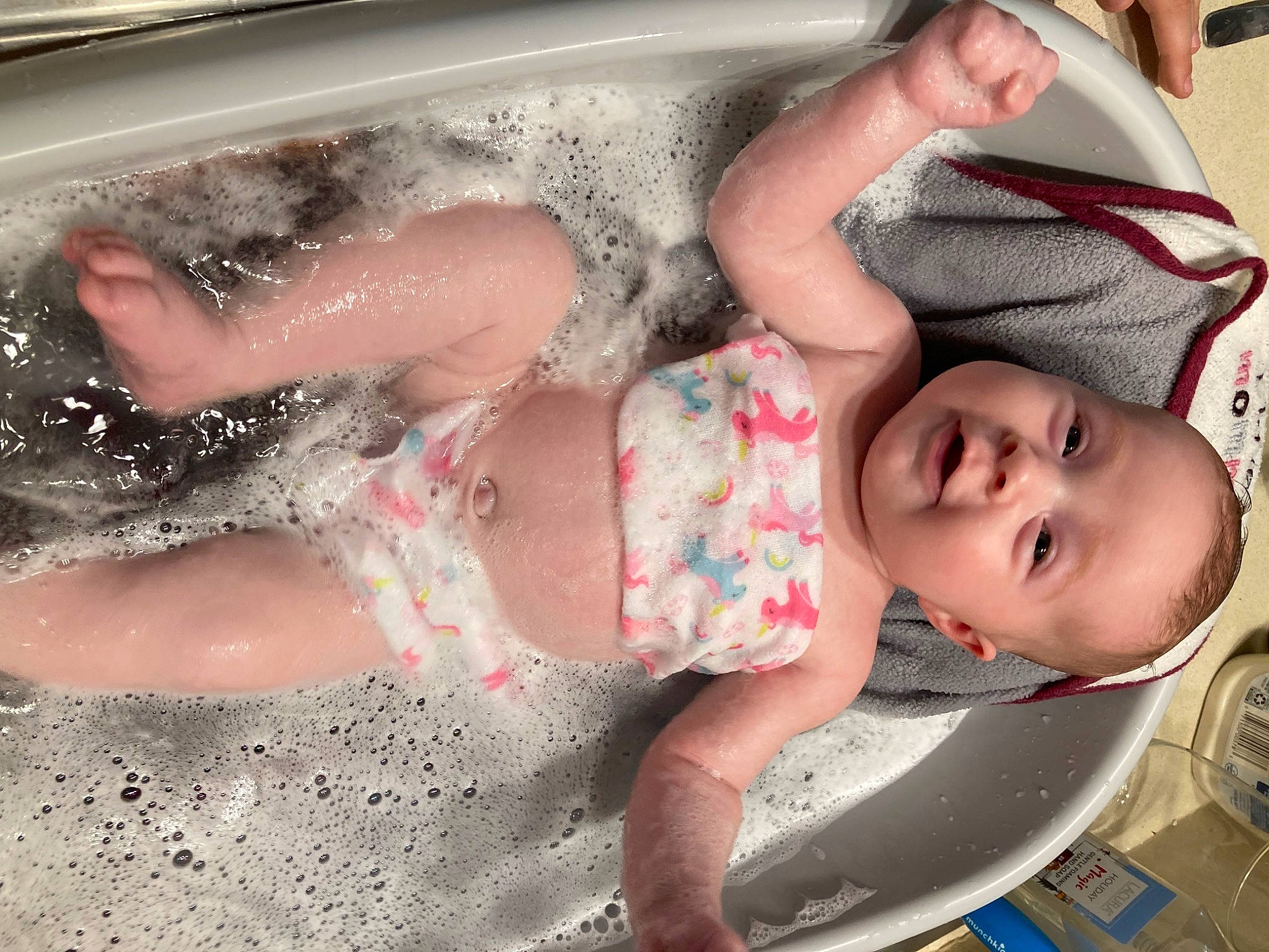 Mackenzie joined the competition — help win amazing prizes! baby, baby_products, baby_toddler_clothing, bathing, chest, child, foot, fun, happy, human_body, human_leg, leg, mouth, muscle, person, pink, skin, swimwear, thigh, toddler