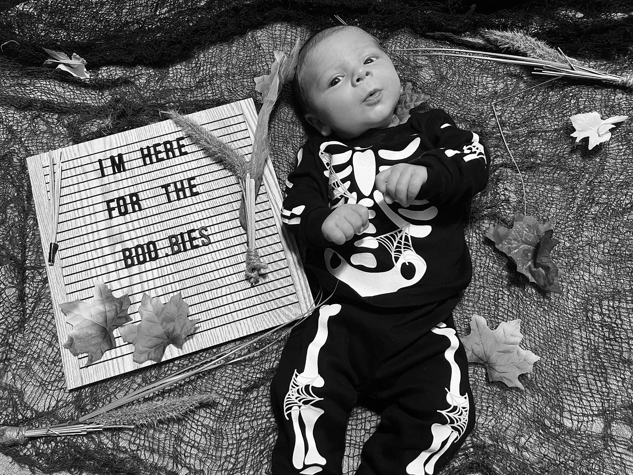 Caleb joined the competition — help win amazing prizes! art, baby, black, black_and_white, darkness, flash_photography, font, grass, happy, illustration, monochrome, monochrome_photography, pattern, people_in_nature, person, photograph, sitting, stock_photography, style, t_shirt