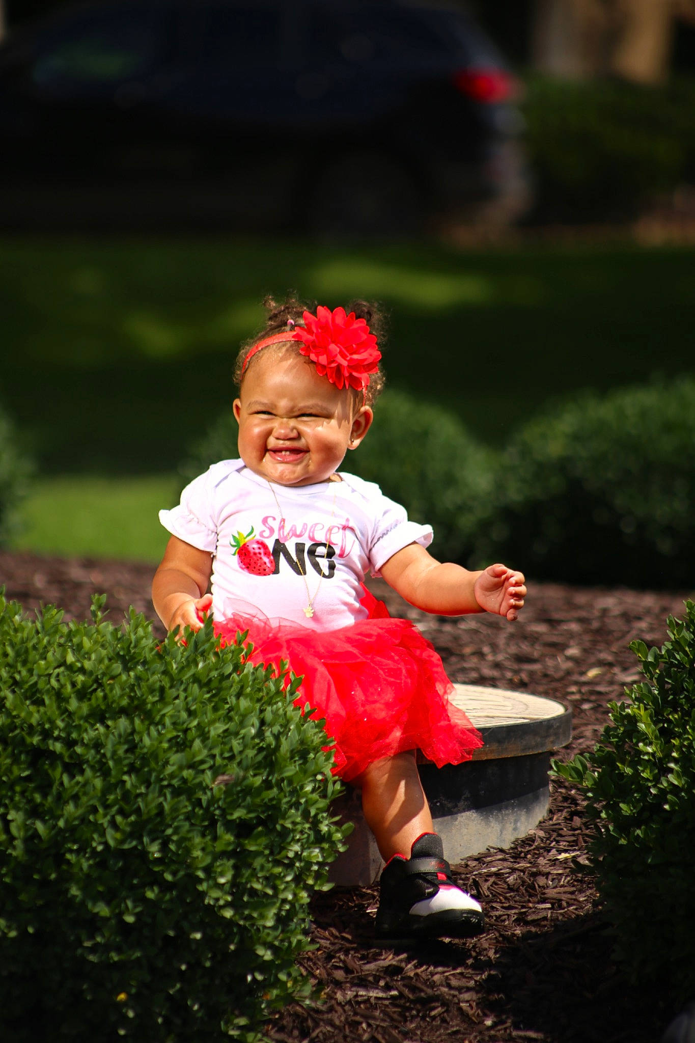 Azavia is registered to the contest to win money with this photo: baby, baby_toddler_clothing, child, flash_photography, fun, grass, groundcover, happy, hat, joy, landscape, lawn, leaf, leisure, people_in_nature, person, plant, sandal, shrub, sitting