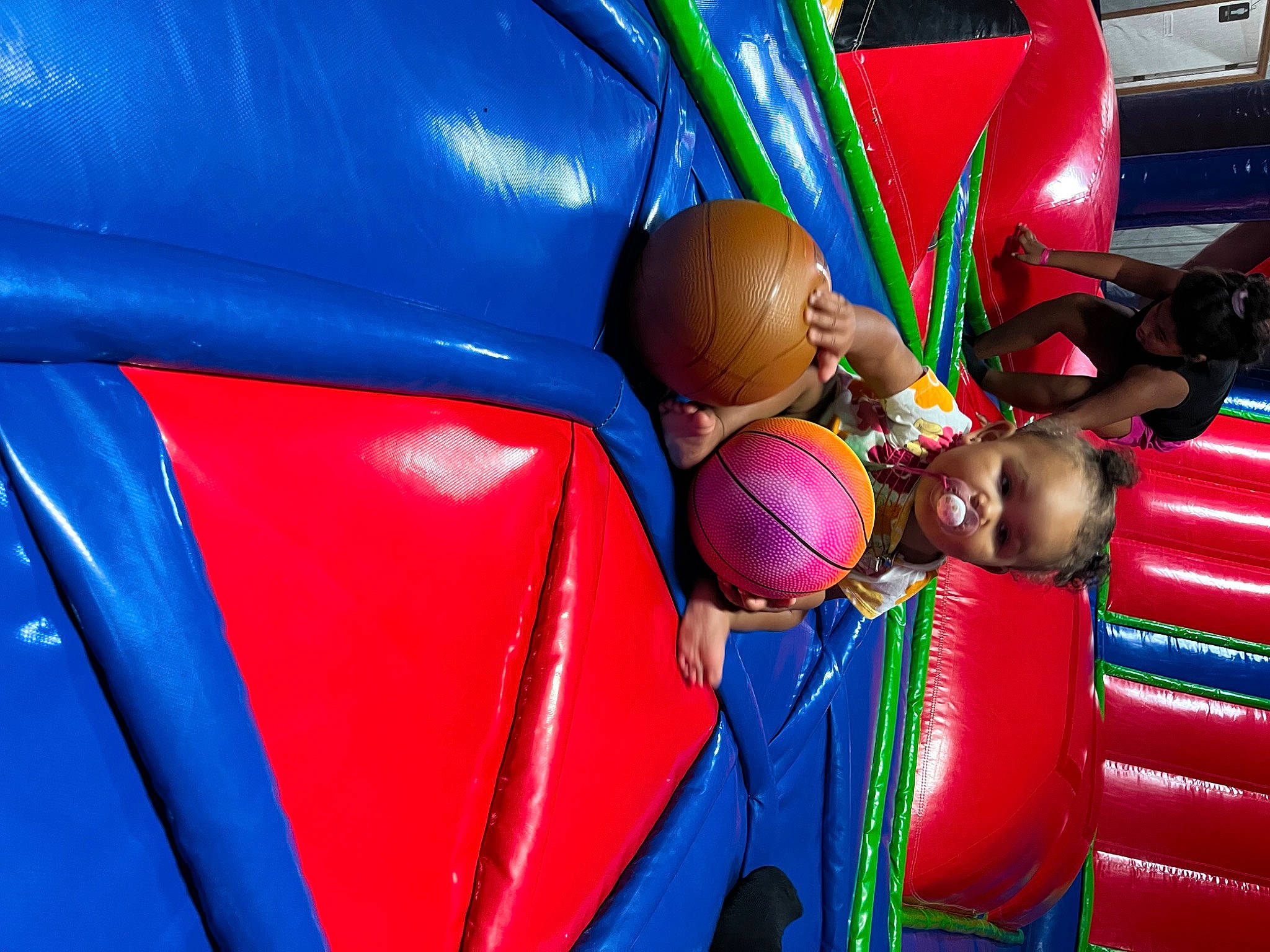 Azavia is registered to the contest to win money with this photo: amusement_ride, ball, blue, bounce_house, chute, electric_blue, event, festival, fun, games, inflatable, leisure, magenta, nonbuilding_structure, outdoor_play_equipment, person, play, playground, public_event, recreation