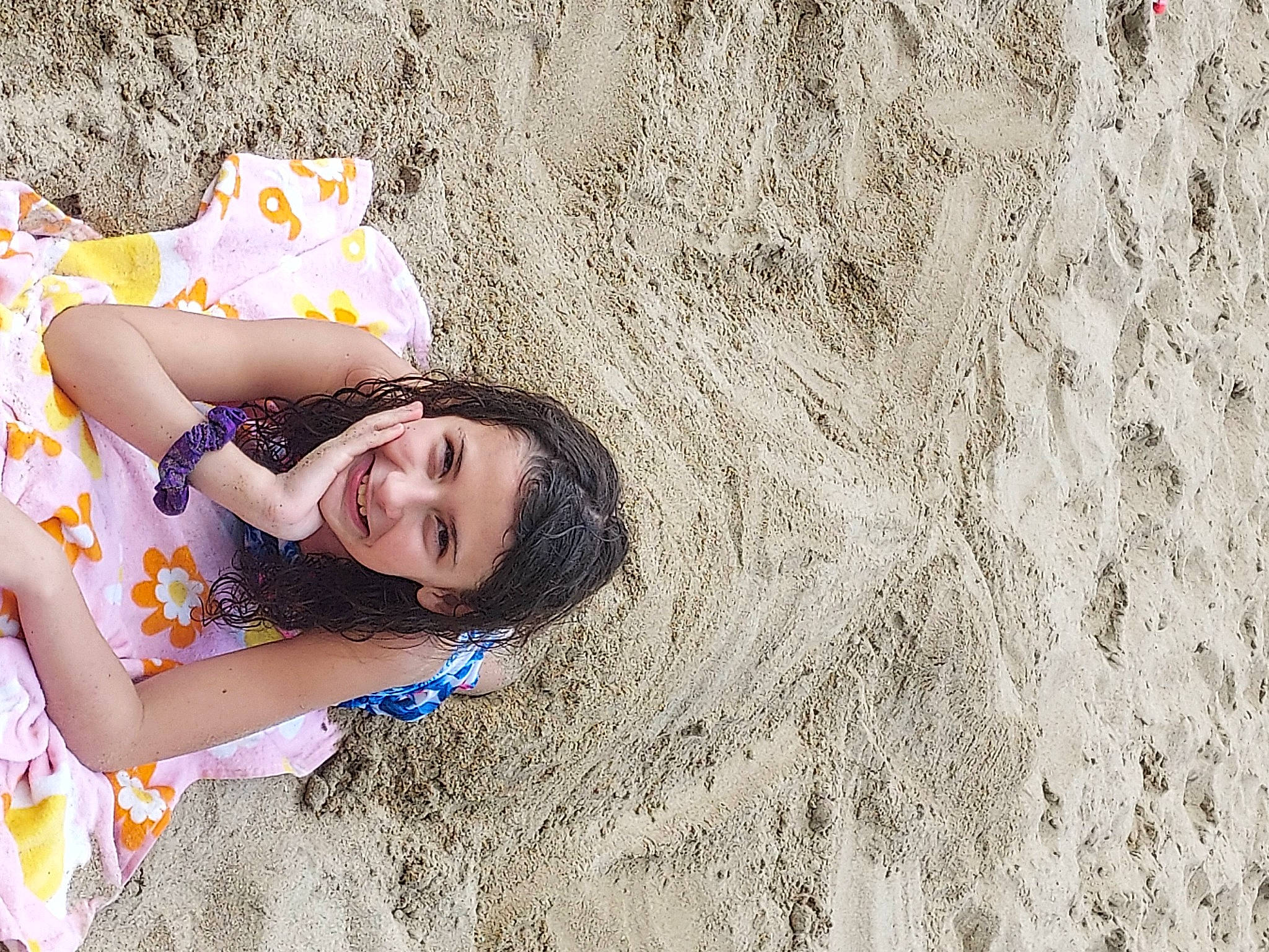 Juliana is registered to the contest to win money with this photo: beach, child, flash_photography, fun, grass, happy, joy, landscape, laugh, leisure, people_in_nature, people_on_beach, person, play, portrait_photography, sand, smile, soil, thigh, travel