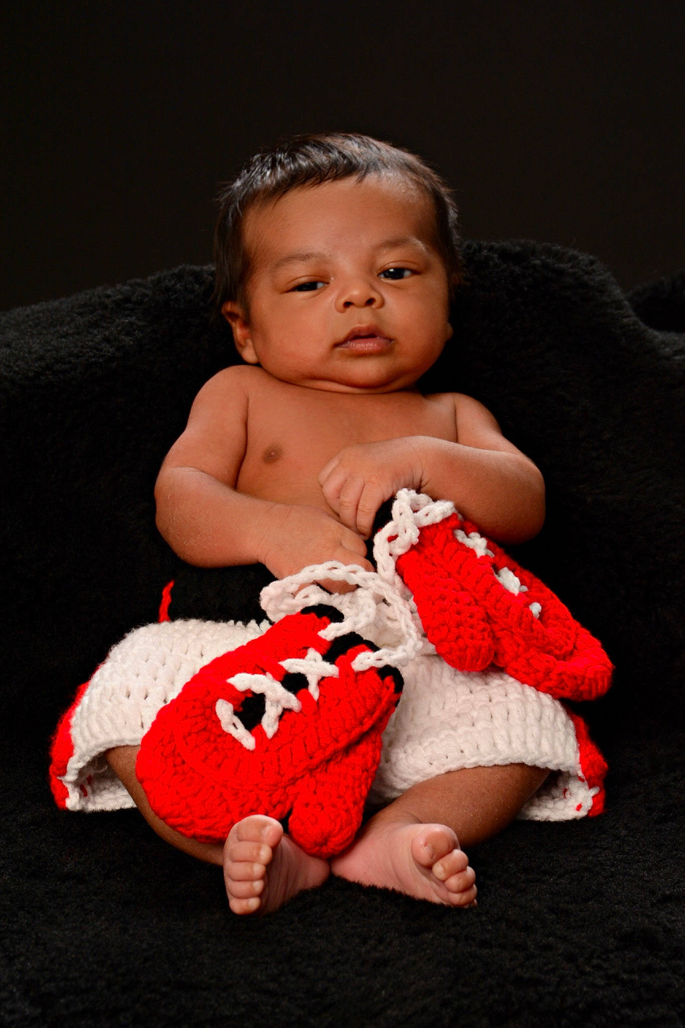 Princeton is registered to the contest to win money with this photo: baby, baby_toddler_clothing, carmine, cheek, comfort, eye, flash_photography, foot, happy, head, human_leg, knee, pattern, person, photo_shoot, portrait_photography, sitting, sleeve, sock, toddler