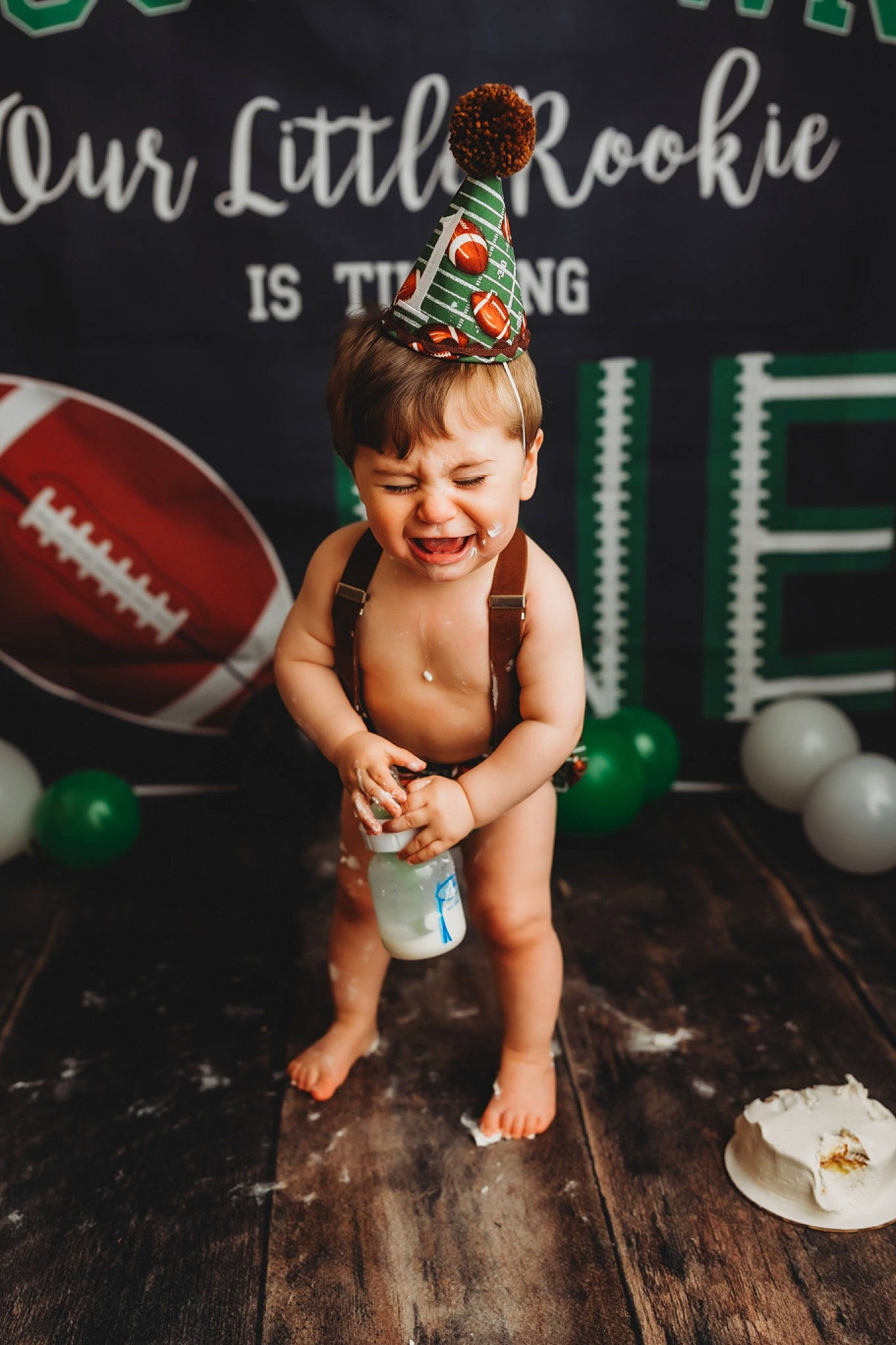Briggs joined the competition — help win amazing prizes! balloon, barefoot, child, event, facial_expression, flash_photography, foot, fun, grass, happy, human_leg, leisure, party, party_supply, person, photo_caption, play, sitting, smile, thigh