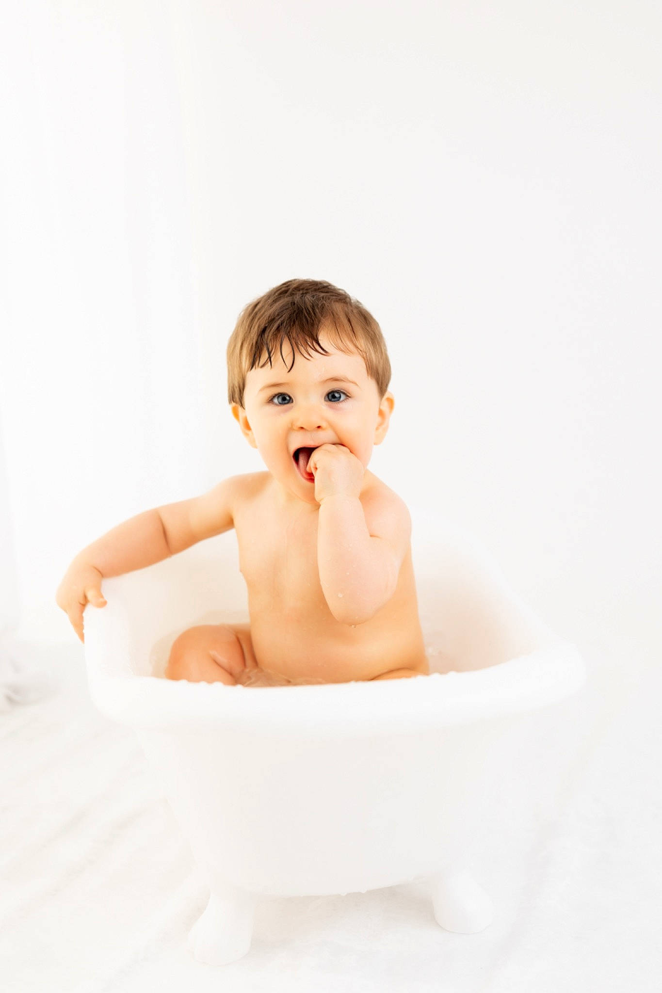 Briggs is registered to the contest to win money with this photo: baby, baby_bathing, bathing, bathroom, bathtub, child, fluid, fun, happy, liquid, person, plumbing, plumbing_fixture, portrait_photography, rectangle, sitting, smile, toddler, water