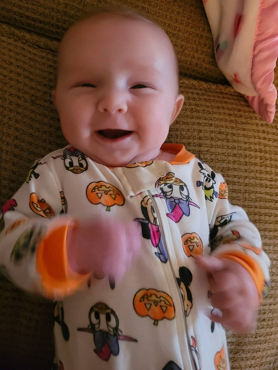 Allison joined the competition — help win amazing prizes! baby, baby_toddler_clothing, bib, cheek, child, collar, comfort, finger, head, iris, lip, nose, outerwear, person, pink, skin, sleeve, smile, t_shirt, textile